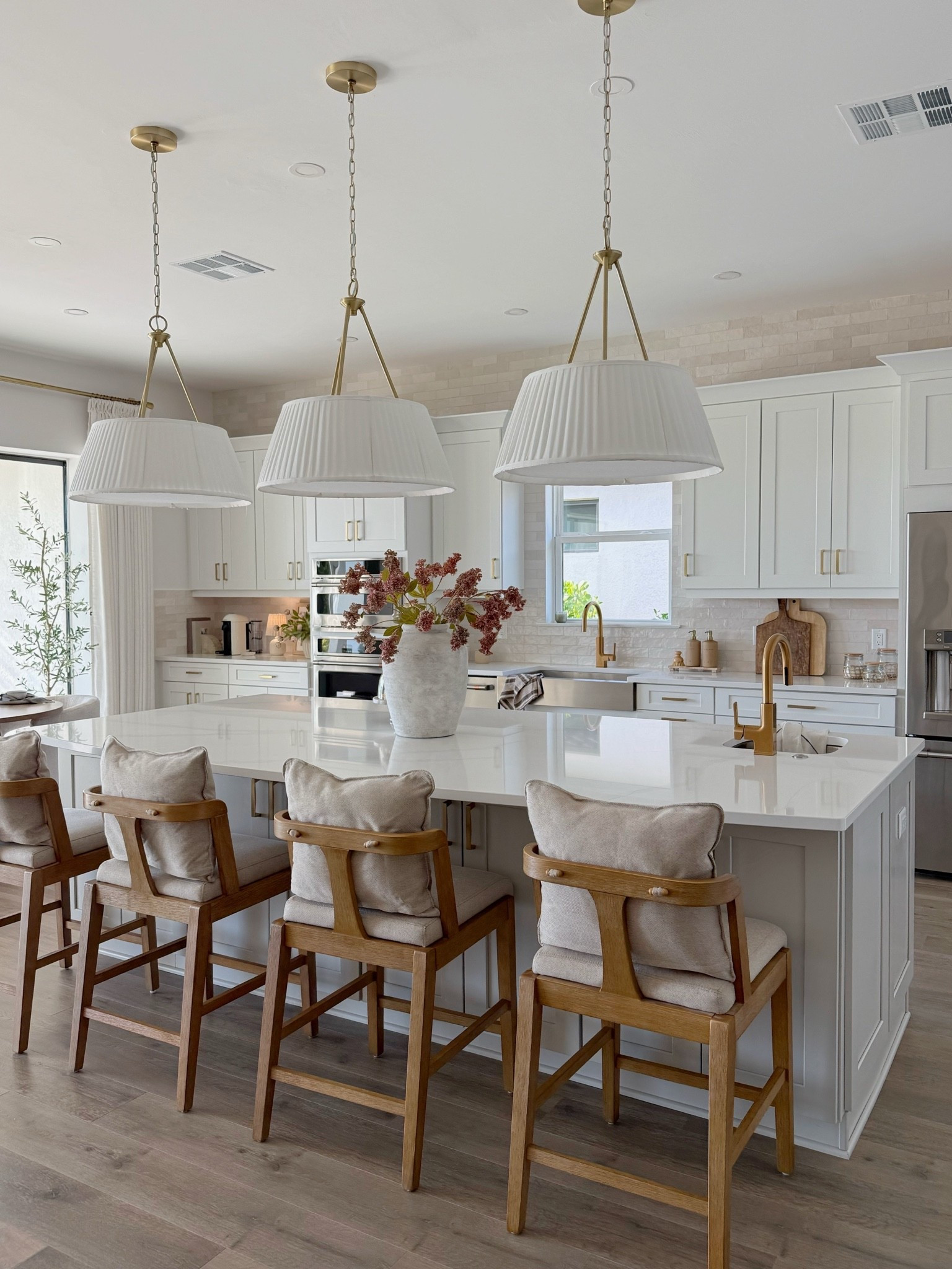 Finally found the stools that made the whole kitchen make sense & These barstools from @Nathan James are so beautiful, featuring warm wood tones and fabric, as well as stunning back details.

Barstools, kitchen chairs, counter chairs, wood barstools, organic modern, kitchen inspo, kitchen decor, kitchen styling


#kitchen #barstools #kitcheninspo #nathanjames #kitchenstyling

#LTKHome