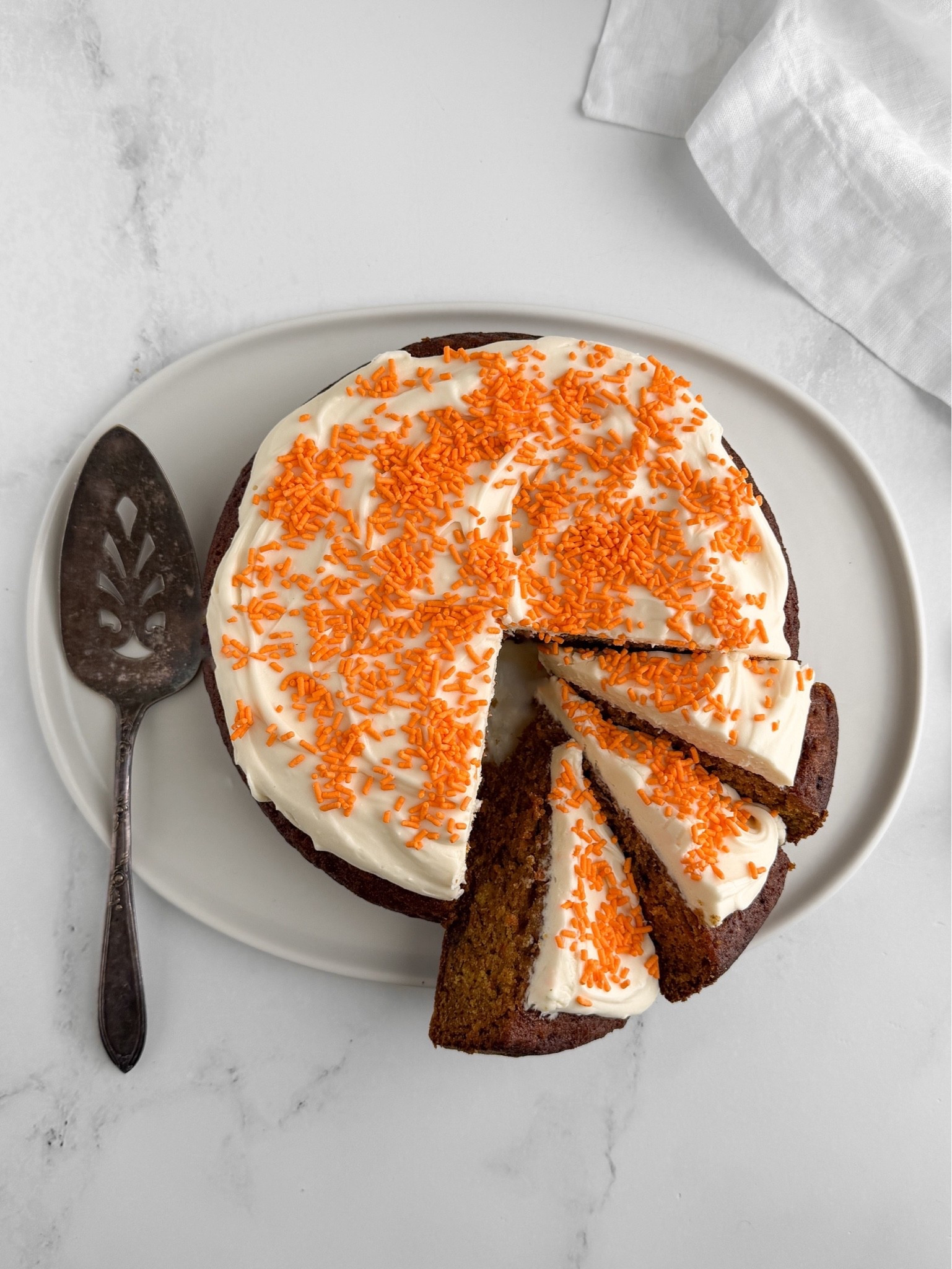 Carrot Snacking Cake Warmly spiced, one bowl, no mixer for the batter, and that cream cheese frosting is non-negotiable. Simple enough for a weekday, special enough for a birthday - which is exactly how this one got used. Everything is linked here. Full recipe at sherisilver.com

#LTKSeasonal #LTKfoodie #LTKHome