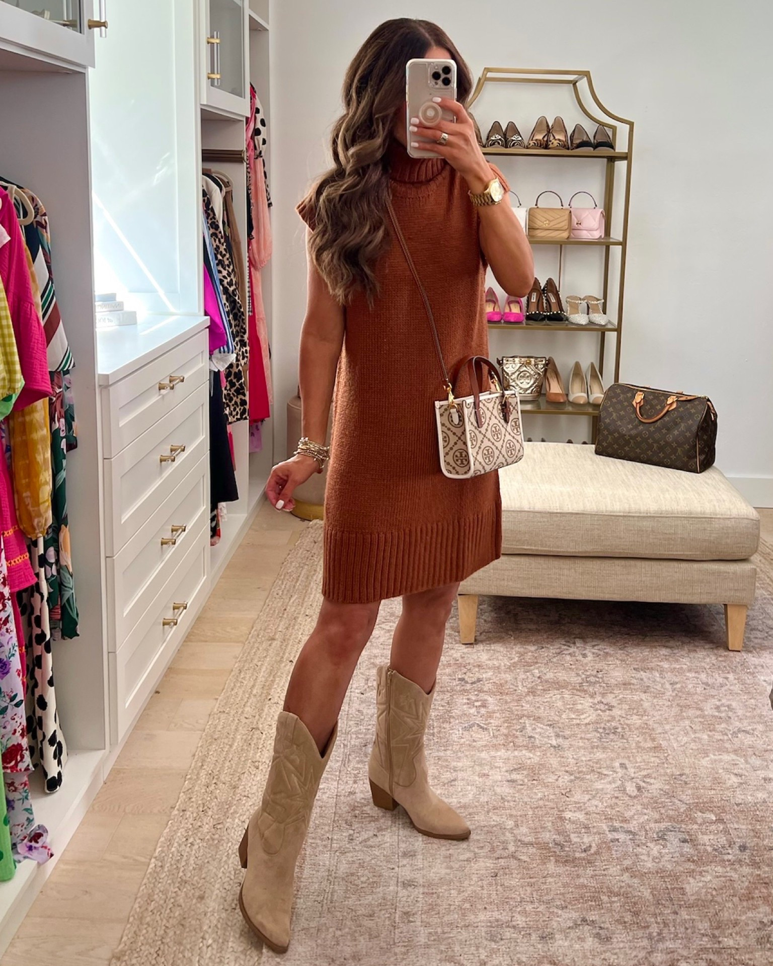 Wearing size S in the dress and 8 in
The boots 