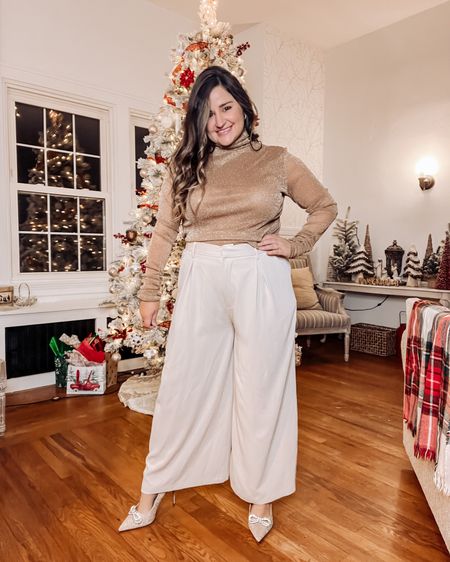 Wearing an XL short in the trousers
Wearing an XL in the sparkly turtleneck
Sparkly heels tts

Holiday outfit, neutral outfit, Christmas outfit, trouser style

#LTKHoliday #LTKcurves