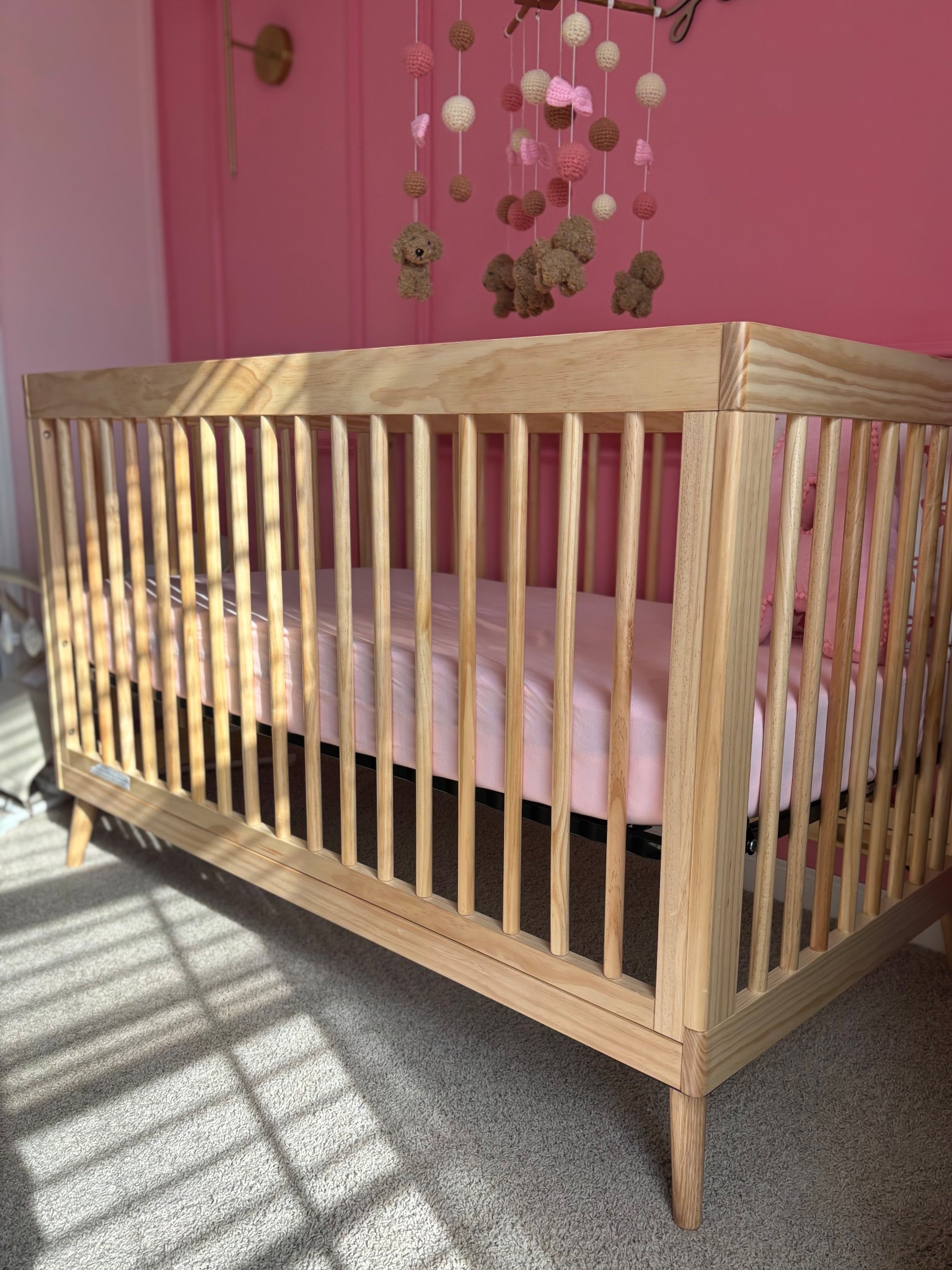 Our neutral crib from Target is officially set up and I’m obsessed 🤍

I wanted something timeless, cozy, and minimal that would grow with baby and this one is exactly that. The soft wood tones + clean lines make it so easy to style with anything, whether you’re going for a warm neutral nursery or adding in little pops of color later on.

It feels high quality, super sturdy, and such a beautiful focal point in the room. I love that it’ll transition with baby as they grow too 🥹

Linked my exact crib + everything we paired with it on my LTK 🫶🏻 #LTKBaby #NurseryInspo #TargetFinds

#LTKmomlife #LTKBaby #LTKBump