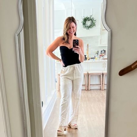 The most comfortable high waisted linen pants with the most versatile strapless top with a sweetheart neckline 🤩 You can dress it up or wear it more casual 🫶🏻 All fits tts.. I ordered both in a size small from Amazon! 

#LTKSeasonal #LTKWedding #LTKTravel