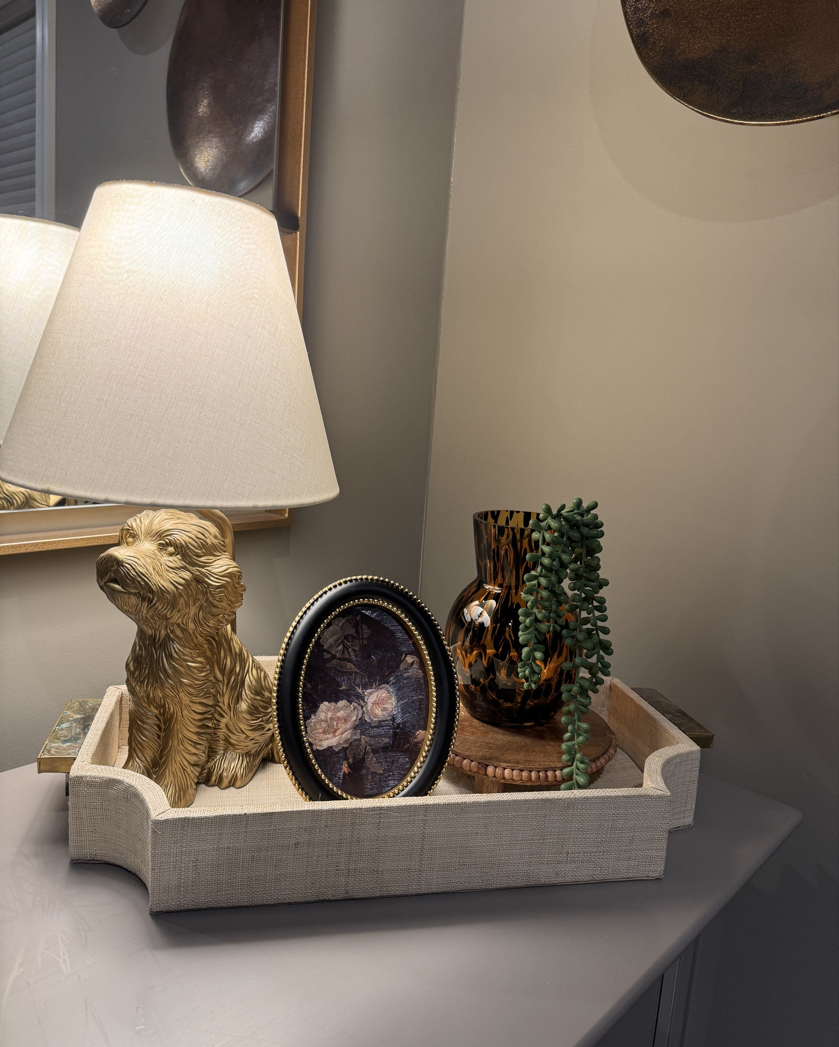 A little corner moment I’m loving 🐾
This adorable doodle table lamp from Walmart gives the softest glow and instantly makes the space feel cozy. I styled it with a tortoise vase and a gorgeous oval photo frame to add texture and a touch of vintage charm. Simple, affordable pieces that look way more elevated than their price. High five Walmart!

Perfect for an entry table, nightstand, or any spot that needs a little warmth and touch of charm! This doodle lamp won’t last long! 

#LTKFindsUnder100 #LTKHome #LTKFindsUnder50