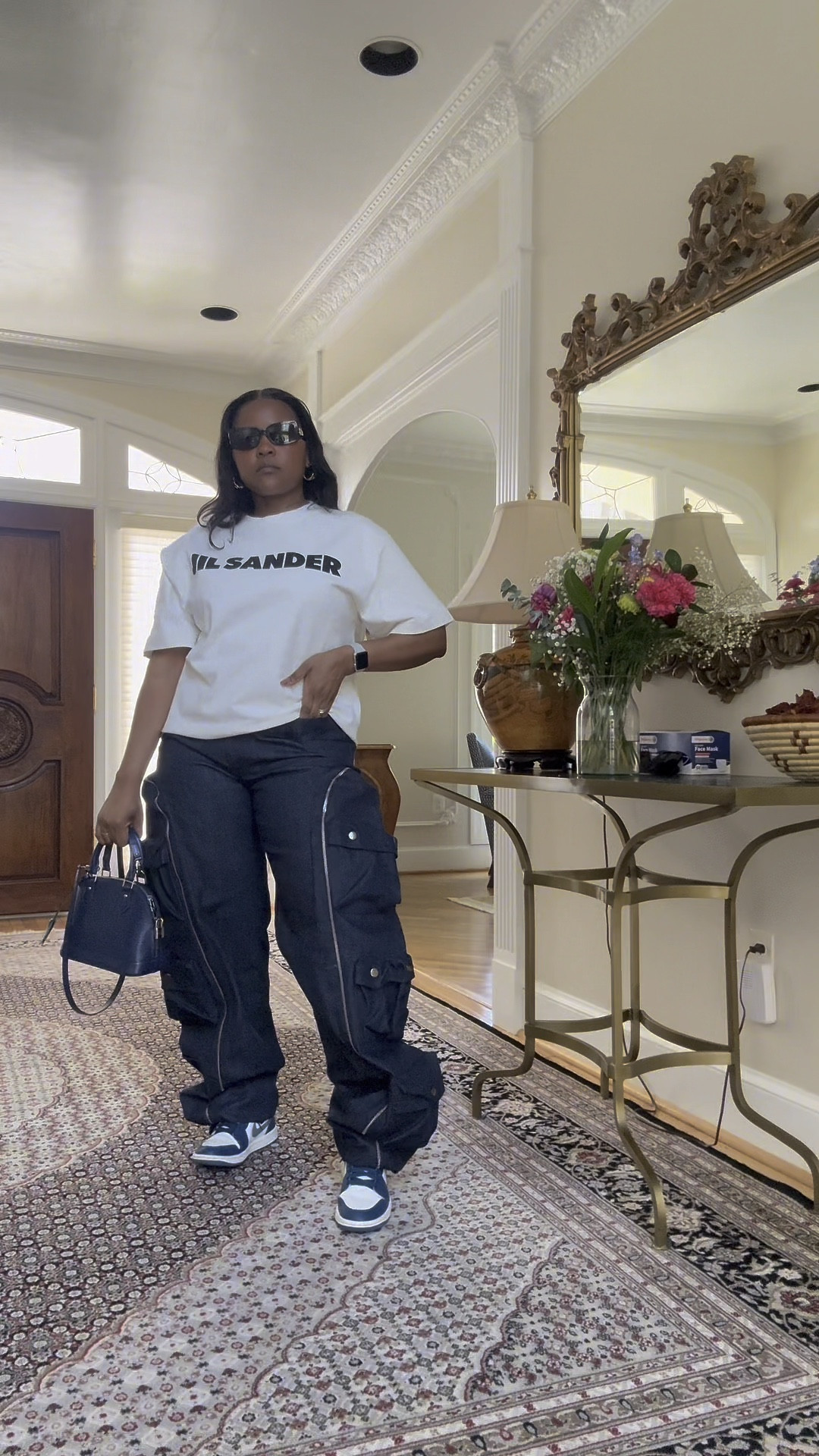 Cargo jeans with a simple white T-shirt. Cargo denims are still in style & make the perfect base for a simple yet stylish outfit   

#LTKVideo #LTKfindsunder100 #LTKsalealert