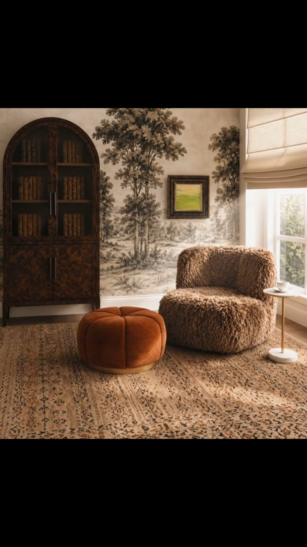 A quiet morning coffee moment, slowly coming to life. ☕️🤎

As the Roman shade gently rises, soft morning sunlight begins to stream into the room, warming this cozy corner little by little. The scenic mural, arched bookcase, artwork, textured lounge chair, marble side table, sculptural ottoman, and hand-knotted rug all feel especially inviting in that first light of the day.

Warm, collected, and peaceful—the kind of corner that makes you want to linger over that first cup of coffee just a little longer.

#MorningCoffee #MorningMoment #LoungeChair #Ottoman #SideTable #HandKnottedRug #RomanShade #WallMural #Bookcase #WallArt #ReadingNook #InteriorDesign #HomeDecor #LTKHome #LTKdayinmylife #LTKSaleAlert

#LTKdayinmylife #LTKHome #LTKSaleAlert