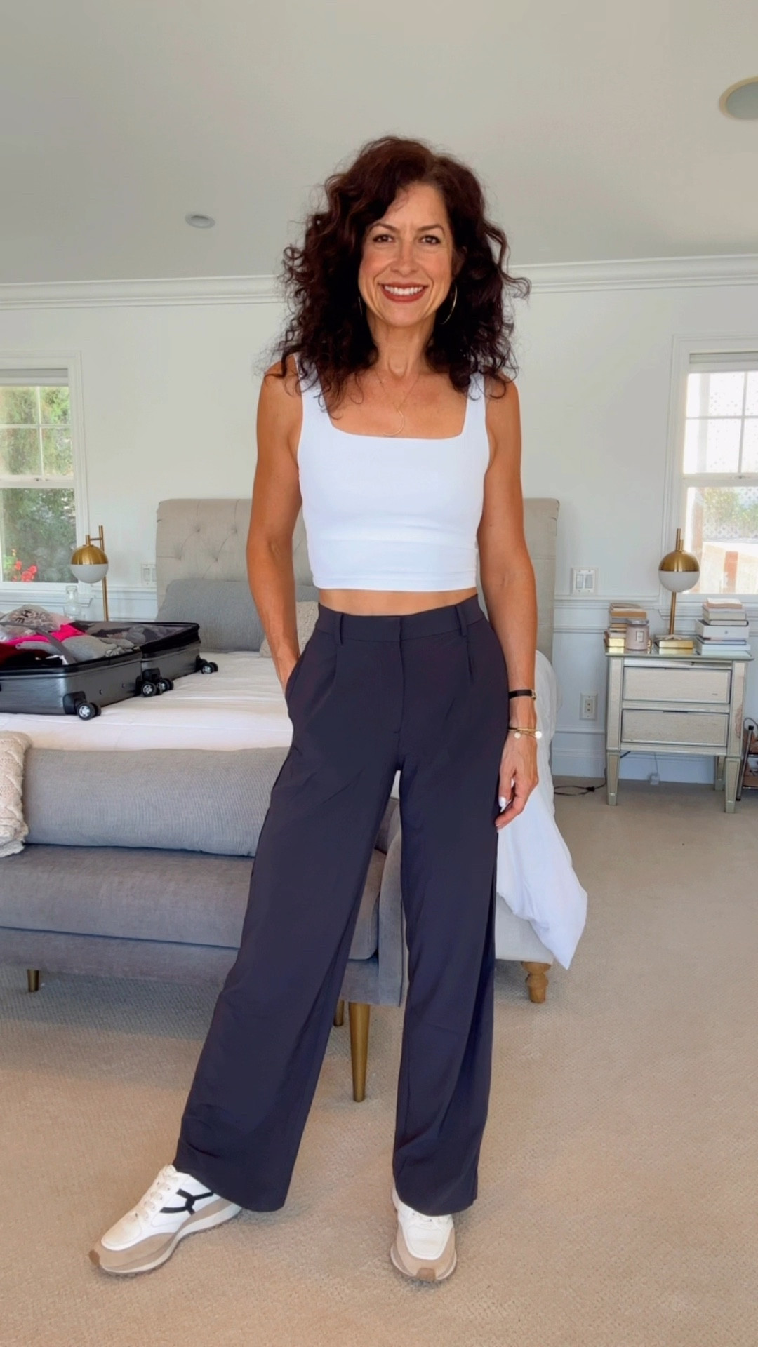 I like to feel put together and comfortable when I travel.  This outfit is my idea of the perfect travel outfit.  These pants look like trousers but they are extremely comfortable and a stretchy, casual material.  The top is soft and budget friendly.  

#LTKTravel #LTKActive #LTKFitness