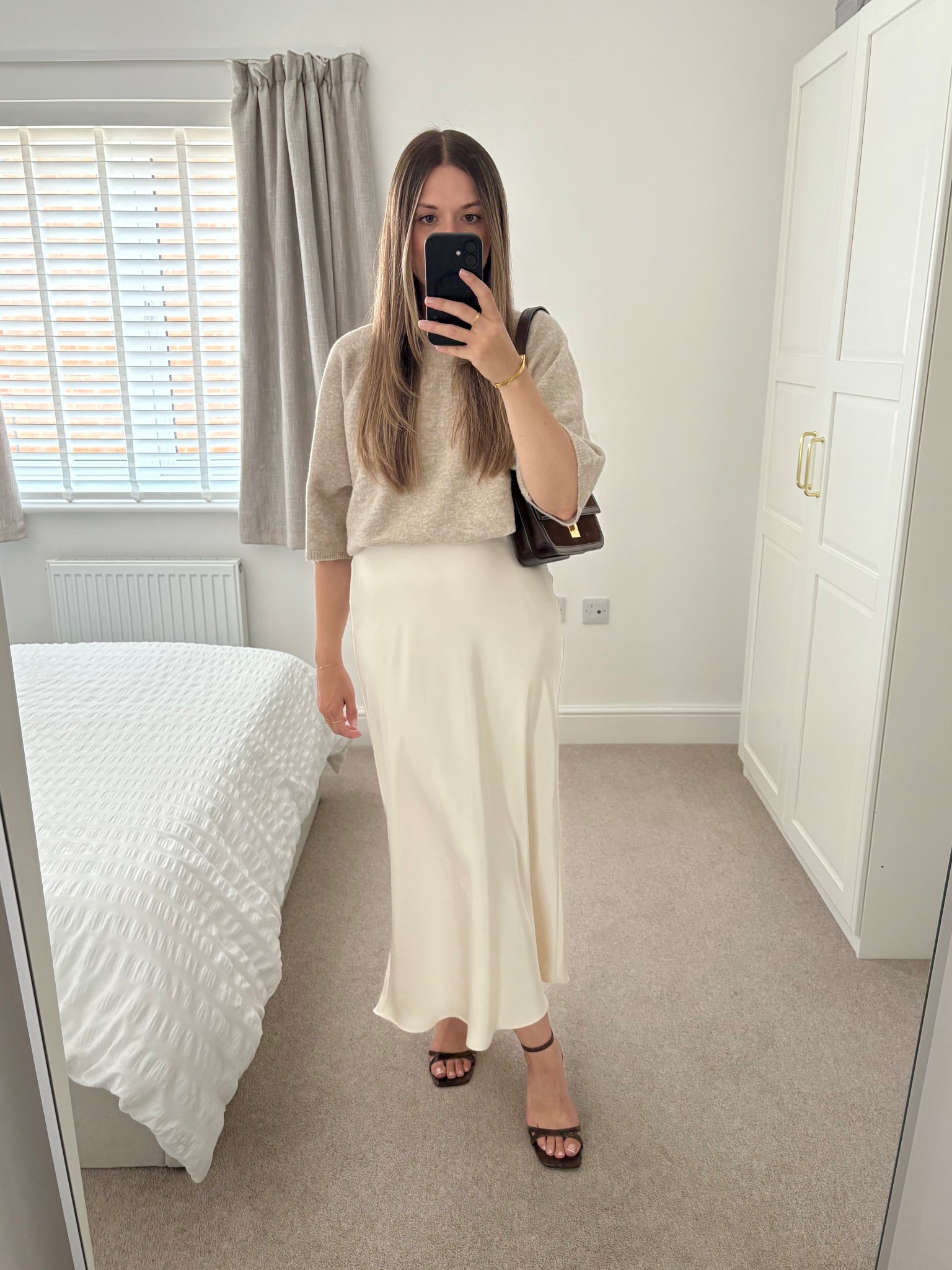 Ways to wear a short sleeved knit jumper 🫶🏼

Dressing it up with a satin slip skirt and pair of heels. I’ve kept things neutral with ivory, beige and browns. 

#LTKstyletip #LTKuk #LTKautumn