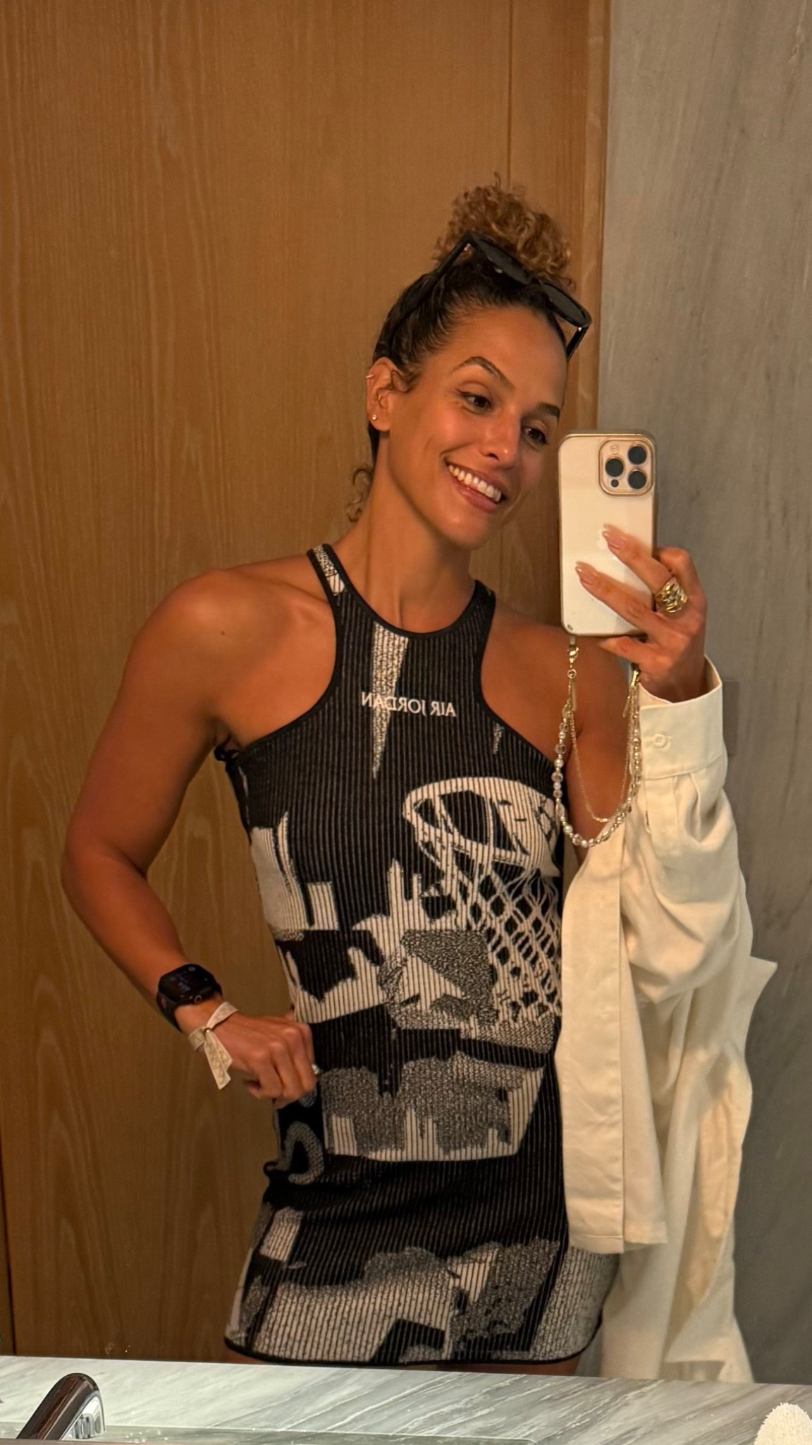 Obsessed with the dress and also the biker shorts! Knit material. Medium in both!
