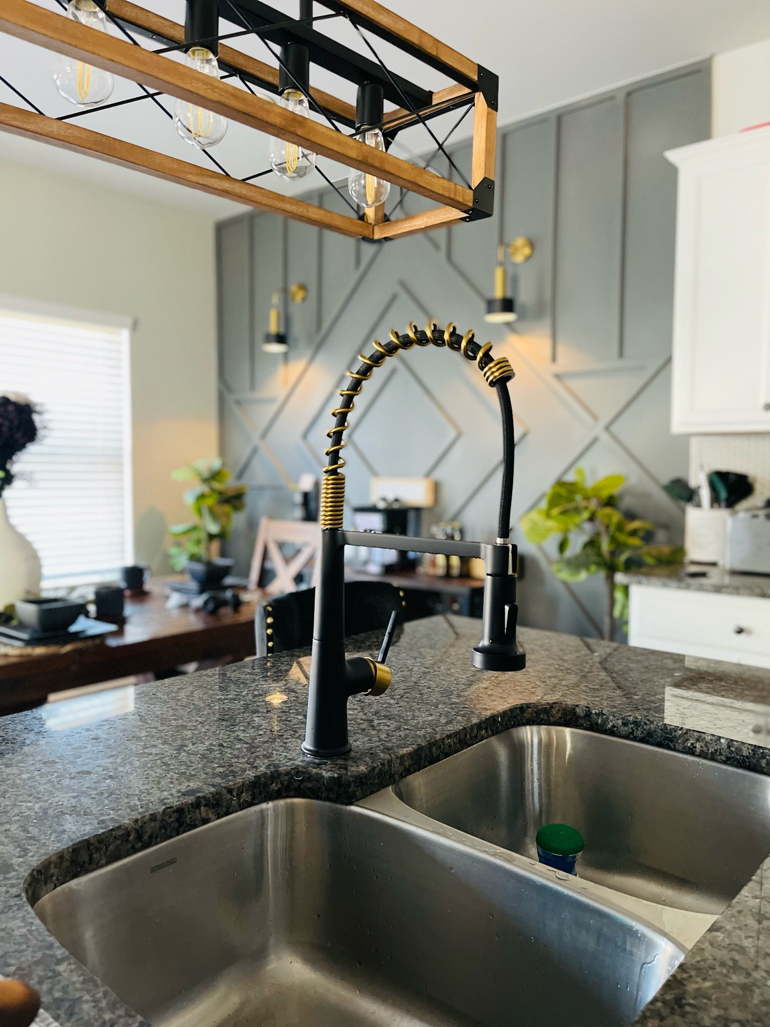 Get into this accent wall, faucet and lighting. Definitely a conversation piece. 

#LTKU #LTKHome