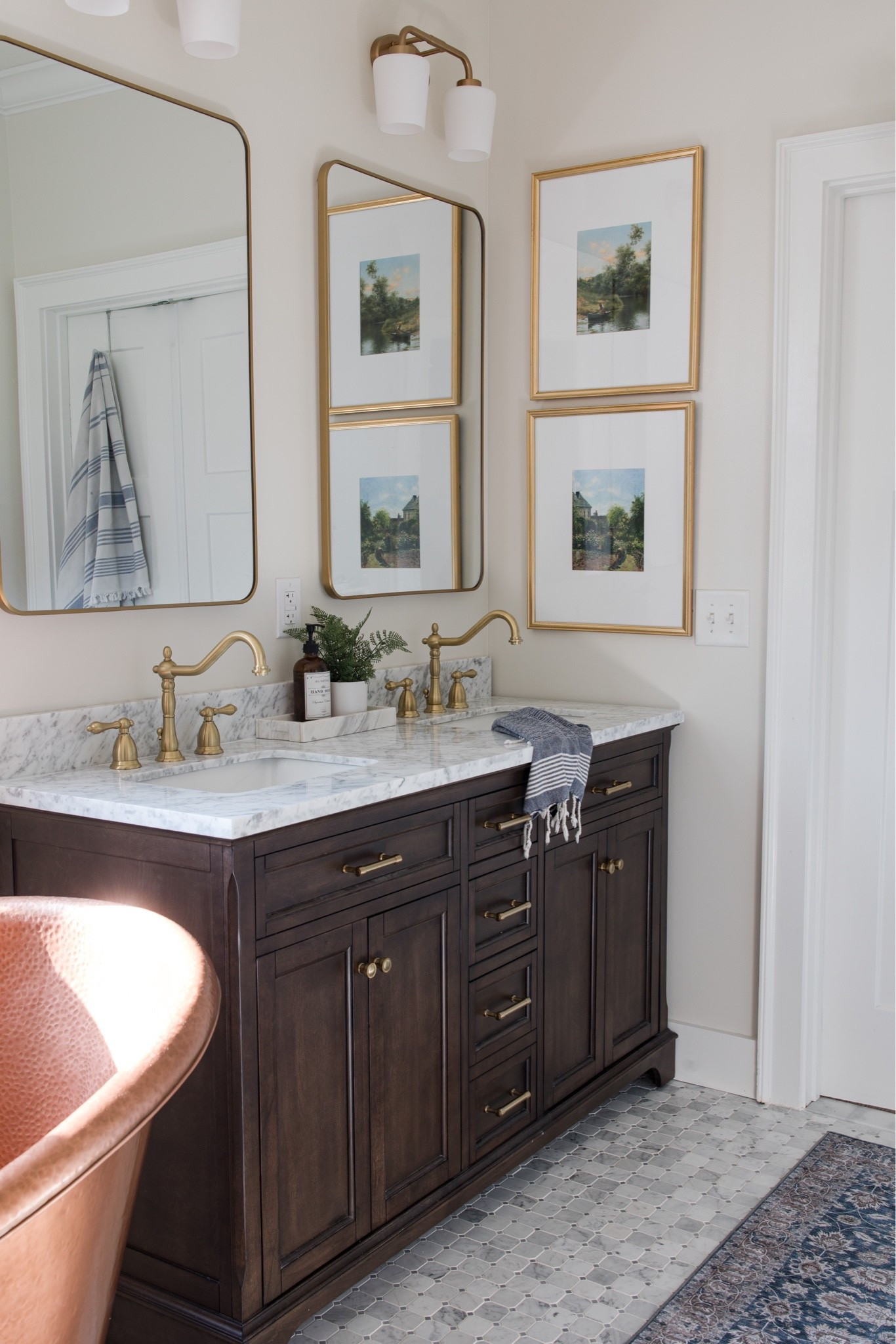 Bathroom remodel with this lovely wood vanity with marble top

#LTKHome #LTKSeasonal