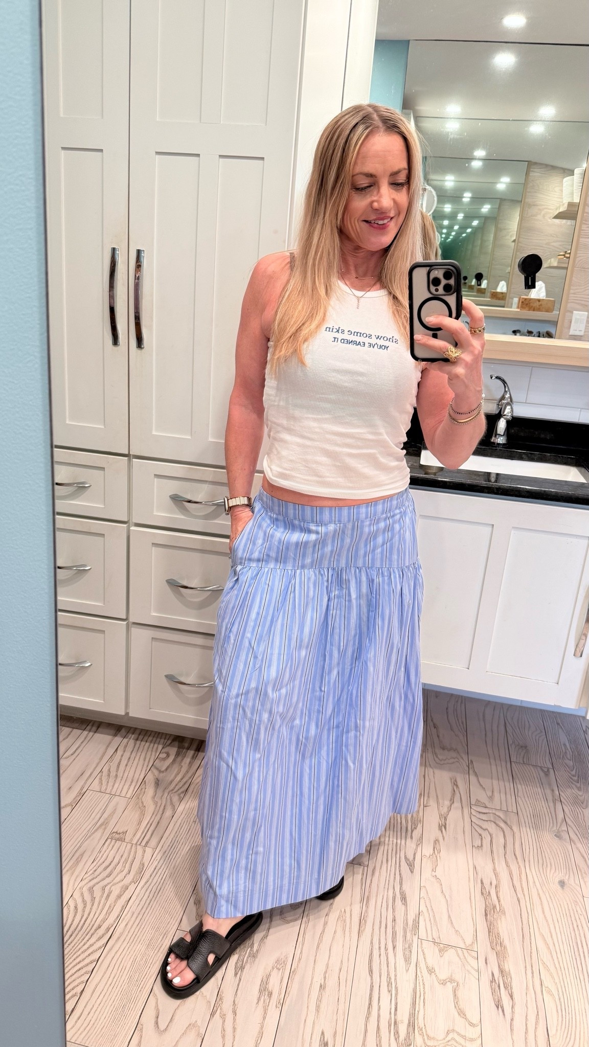 Maxi skirt and white tank always looks summery.

#LTKootd #LTKOver40