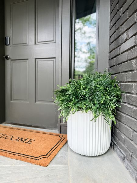 BACK IN STOCK! Under $30 Planter! This planter is my favorite way to refresh a patio or porch! The sleek lines give it an elegant, modern touch, and I love that it is large enough to contain a large fern or plant arrangement! They always sell out because they are such an amazing value, so I would run to grab them if you’re looking for an easy way to refresh your patio! I ordered two to place on either side of my front door as an easy way to update my front porch decor. I placed a large bucket inside first to make sure that my ferns sit high in the planter. I love the look, and will reuse these planters for many seasons to come! Grab them while they are still in stock!

Patio Decor, Front Porch Decor, Outdoor Patio, Porch Decor, Planter Ideas, Large Fern Planters, winter refresh, spring refresh, and luxury for less, finds under 30, finds under 50

#LTKSaleAlert #LTKHome #LTKFindsUnder50