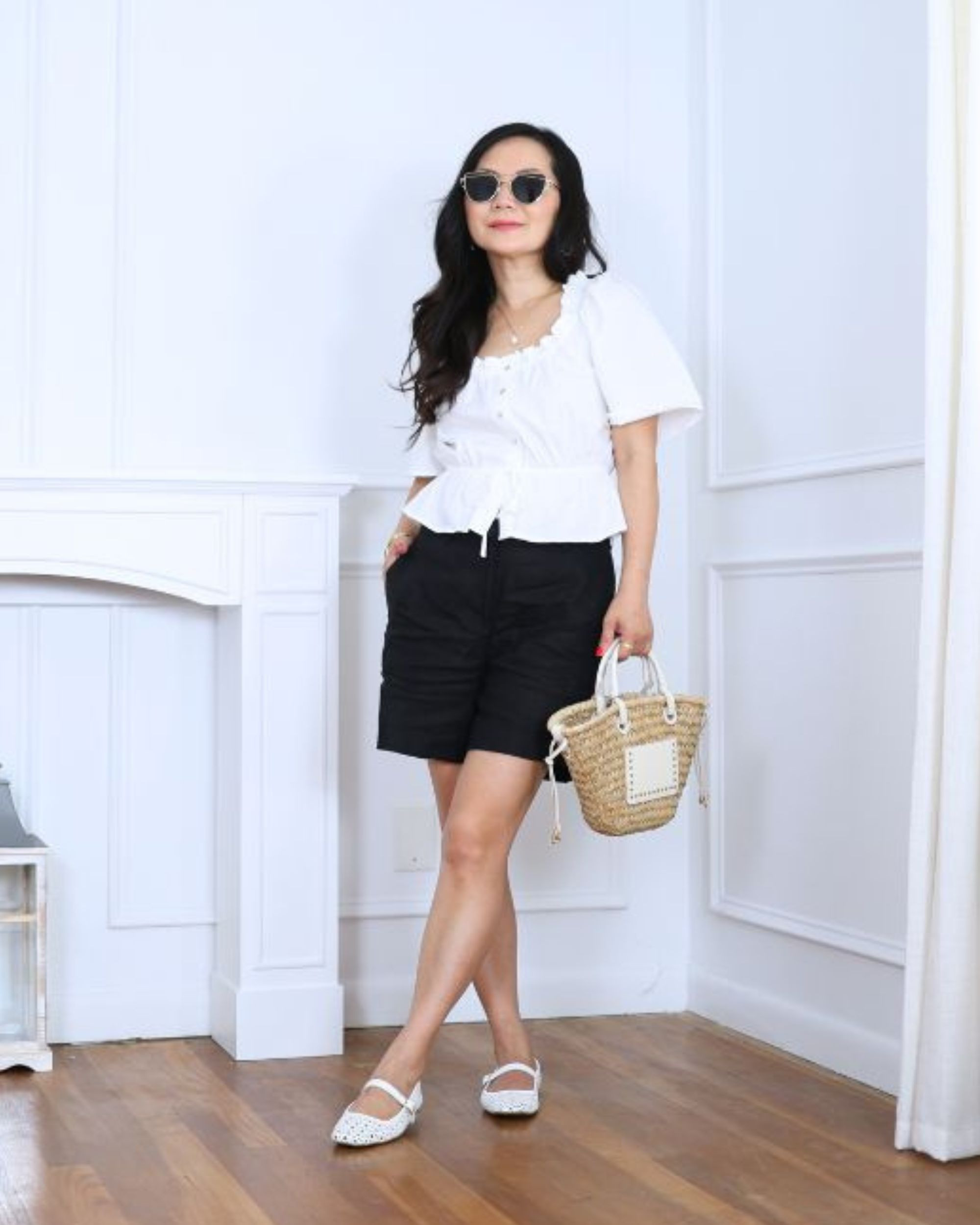 Easy, breezy, and a little bit romantic 🌿 I’m 5’2” (petite) and love how this ruffle-trimmed cotton blouse from H&M (XS) pairs with black linen shorts. Added a small raffia bag and mary jane flats for a look that feels sweet, effortless, and perfect for warm summer days.

#LTKOver40 #LTKPetite #LTKStyleTip