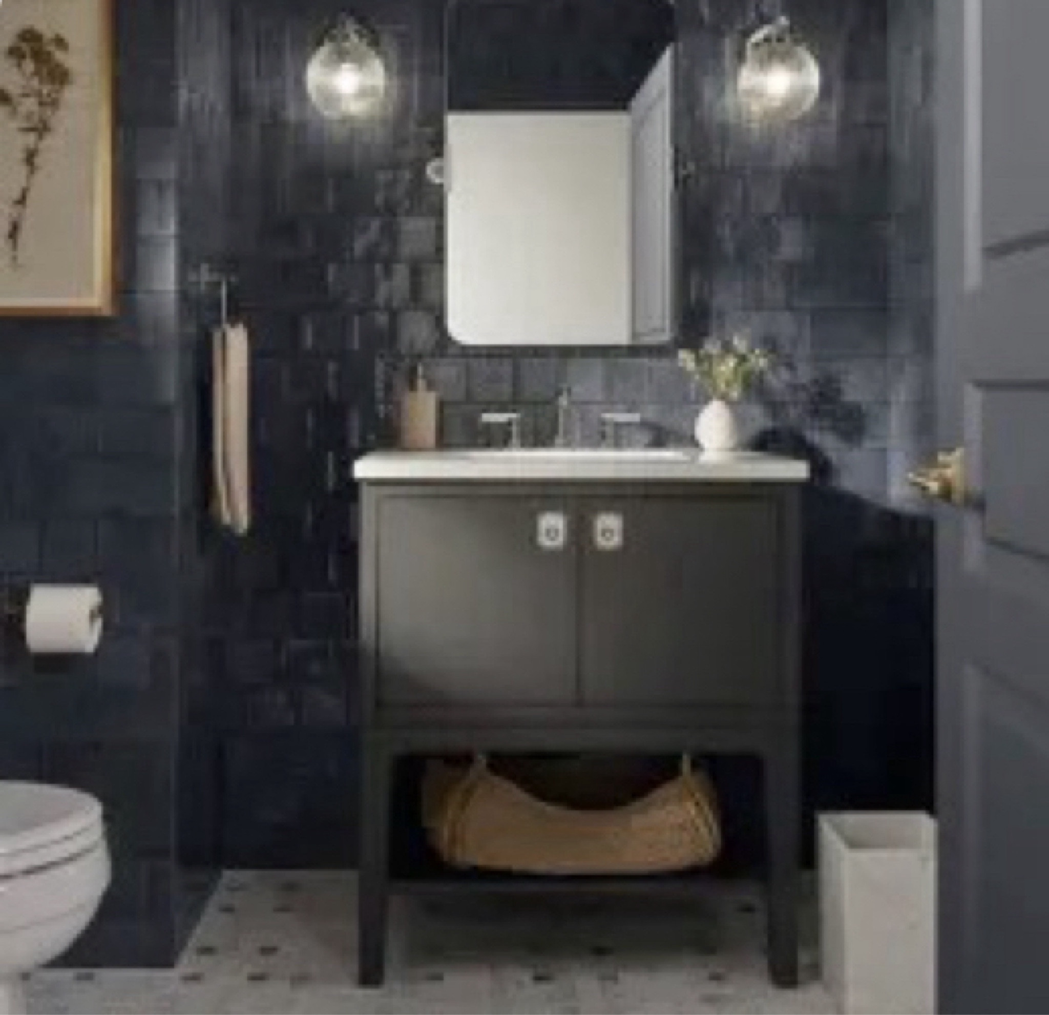 
Kohler’s Six-Day event starts now: Now through May 28, save 5% on orders more than $750, and 10% on orders of more than $1,500. Redeem with code SIXDAYS. 

Collaborating with Studio McGee, Kohler just launched a new kitchen and bath collection which is available online now.  We love the clean-lined yet classic inspired design that is warm and inviting. In this Kohler x Studio McGee powder room, from the tiled walls to the vanity to the door and trims,we love the shades of black and gray which create such a cocooned space that is chic, stylish and moody. We love how the polished nickle and white countertop pop up from the dark background. 


#LTKSaleAlert #LTKSeasonal #LTKHome