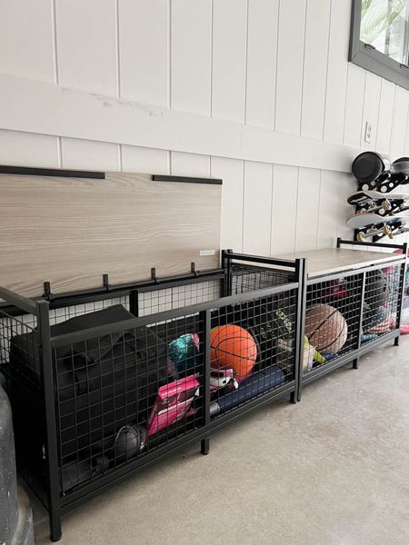 Storage Solution That Transformed Our Garage! We used two of these heavy duty storage benches with hinged lids on top of wire bins as a catchall for balls, sports gear, sidewalk chalk, helmets, and any other small outdoor toys.  

Garage, storage, organization, refresh, new year, spring cleaning 



#LTKfamily #LTKstyletip #LTKhome