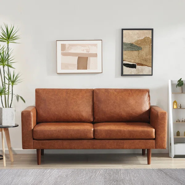 Ashvini 65" Faux leather Square Arm Loveseat with Reversible Cushions | Wayfair North America