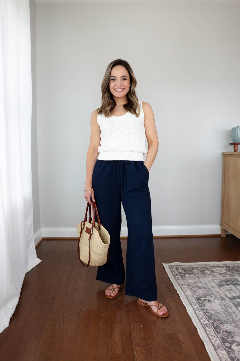 I found another pair of crepe pants you can wear casually and to work! 

Very similar to Aritzia’s Lodge Pants. An inch shorter (27” inseam) and the fabric is a little thicker the the lodge pants. They run a little large. I recommend a size down if in between sizes. Inseam can increase slightly as sizes go up. 

Pants (LOFT): petite xxs 
Sweater tank (Quince): xs 
Sandals (Dolce Vita): true to size 

#LTKPetite