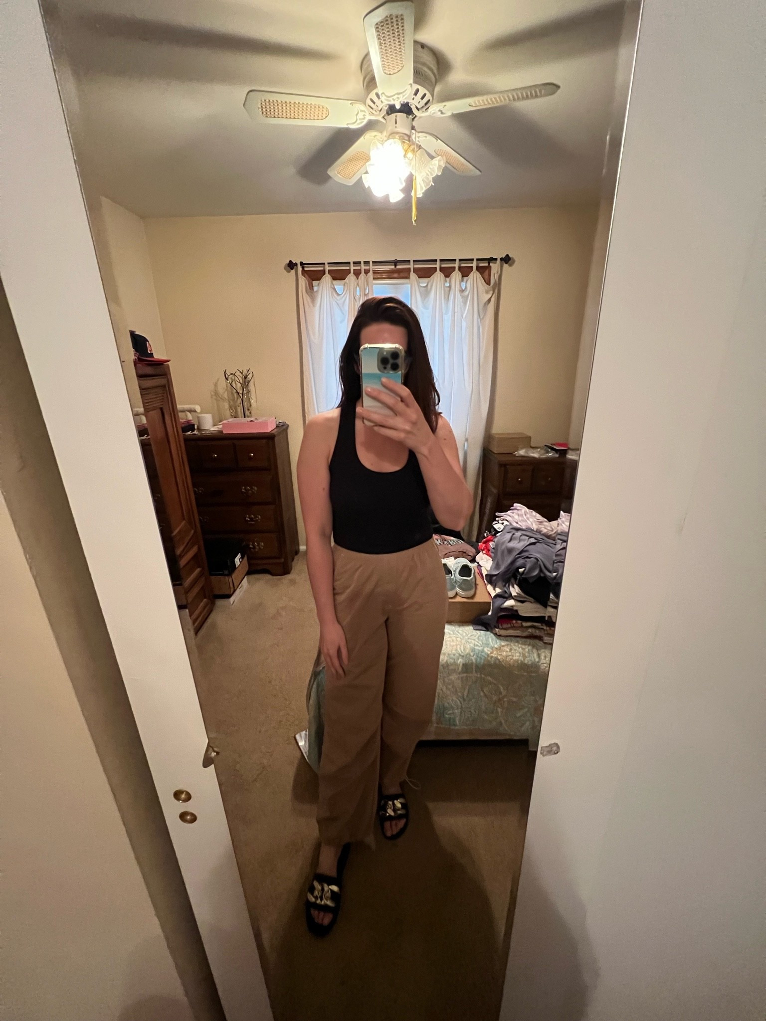 Black ribbed tank (s). Beige drawstring swishy pants (s). Black and gold chunky slides (8.5). #tank #ribbedtank #blacktank #pants #swishypants #drawstringpants #beigepants #slides #sandals #blacksandals #goldslides #blacksandals #datenightoutfits 
date night outfits 
summer outfit

#LTKootd #LTKSeasonal