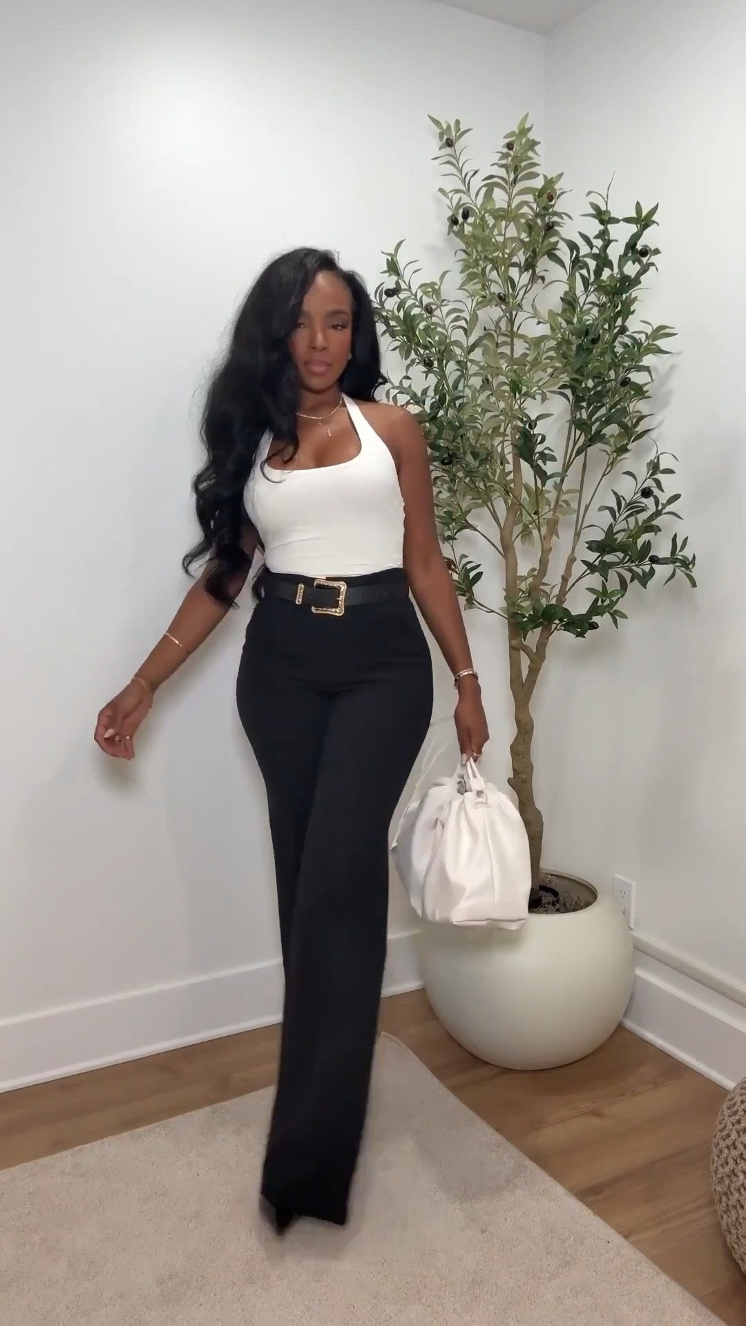 ✨ Effortless Everyday Elevation

Clean, classic, and endlessly wearable. This fitted white tank paired with tailored black pants creates a timeless, flattering silhouette you can rely on again and again. Finished with a structured white bag and pointed-toe heels, it’s the kind of elevated basic that works across seasons and always earns its cost-per-wear.

Perfect for:
• Workdays
• Dinner plans
• Casual meetings

📏 Sizing:
Top: Small
Bottoms: Small / 4 Long
Shoes: True to size
Bag: One size

Measurements:
5’4” · 138 lbs · 34D · 27” waist · 40” hips

Save this post for later.

Capsule wardrobe staples, elevated everyday basics, classic black-and-white outfits, chic minimalist style for women.

Follow me on Instagram and YouTube @kirasfashionfinds

#LTKgrwm #LTKootd #LTKPetite