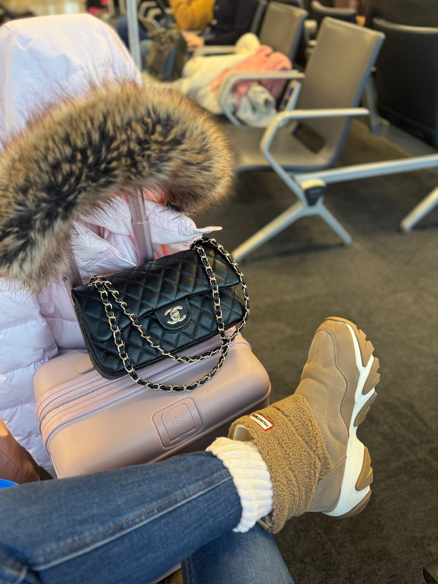 Travel day! These Hunter boots are so comfy and kept my feet so warm! 

 #LTKSeasonal