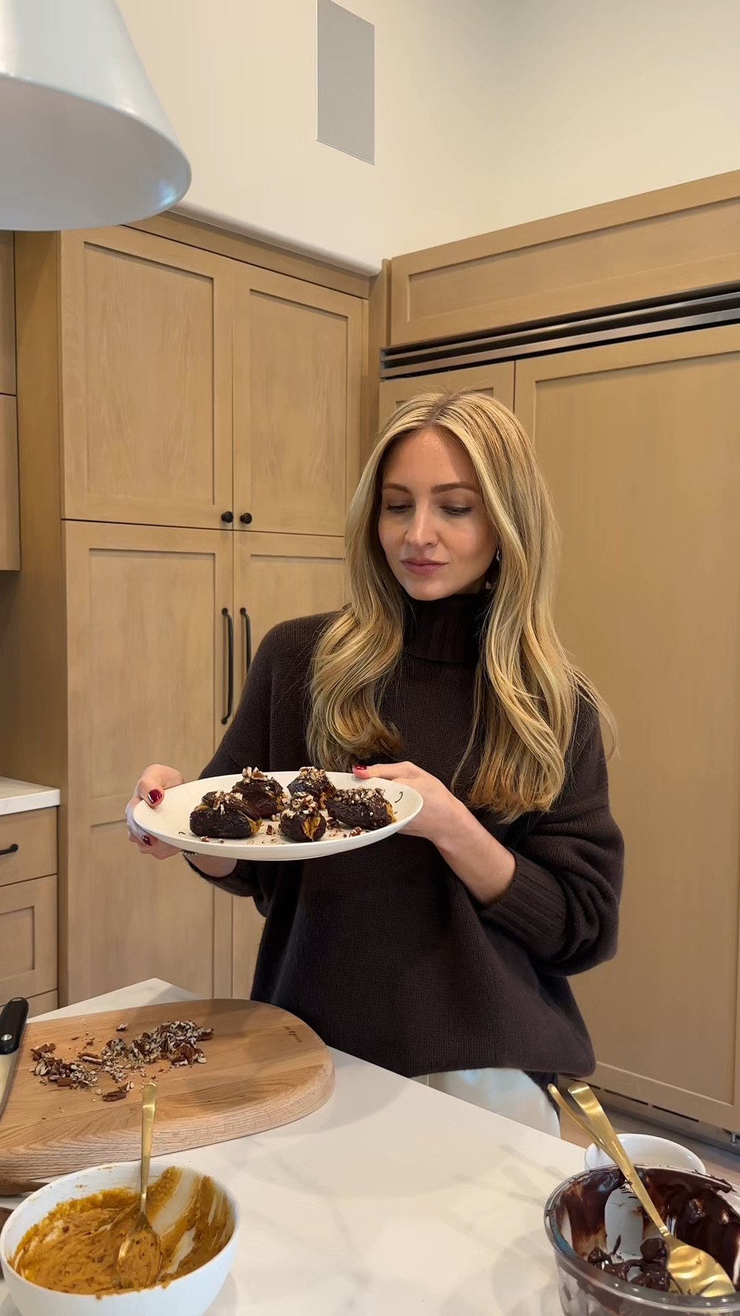 Pumpkin stuffed dates - the yummiest winter snack! So easy - recipe below and I’ve linked this chocolate turtleneck sweater and ivory pants here too

8 medjool dates halved/pits removed
1/4 cup pumpkin puree
1/4 cup peanut or almond butter
1/2 cup dark chocolate chips melted
Optional chopped pecans
Flaky sea salt

#LTKHoliday #LTKWatchNow