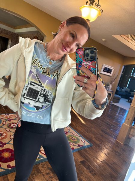 Wearing the comfiest lululemon align leggings, graphic cropped t-shirt, cream color scuba full zip jacket, and golden goose furry slides. Graphic tee is old but will link similar styles. Size 4 in leggings. Size 7.5 in sandals. Size small in graphic tee. Size xs-s in jacket. 

#LTKTravel #LTKFitness #LTKStyleTip