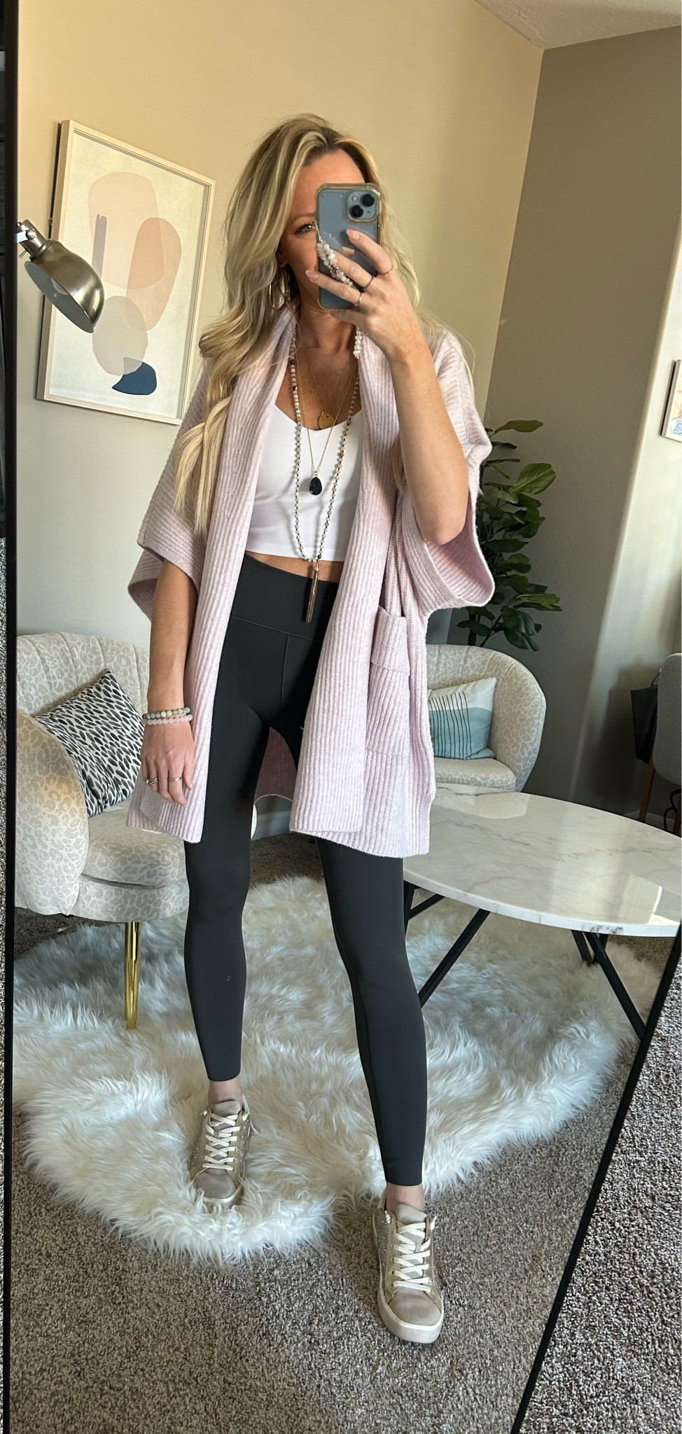 This “cape” is soo comfortable! Its a perfect transition piece for winter to spring. These luxe leggings are beyond comfortable. And this sports bra is long enough to not show too much tummy with leggings 🤣. Anyone else feel a little awkward showing too much skin at school pickup?! 

#LTKstyletip #LTKfindsunder100 #LTKMostLoved