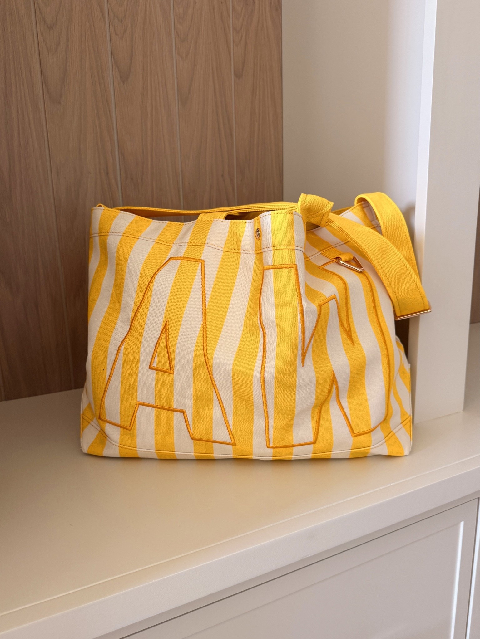 Absolutely love this striped canvas tote! This is the large.

#LTKmomlife #LTKSwim #LTKTravel