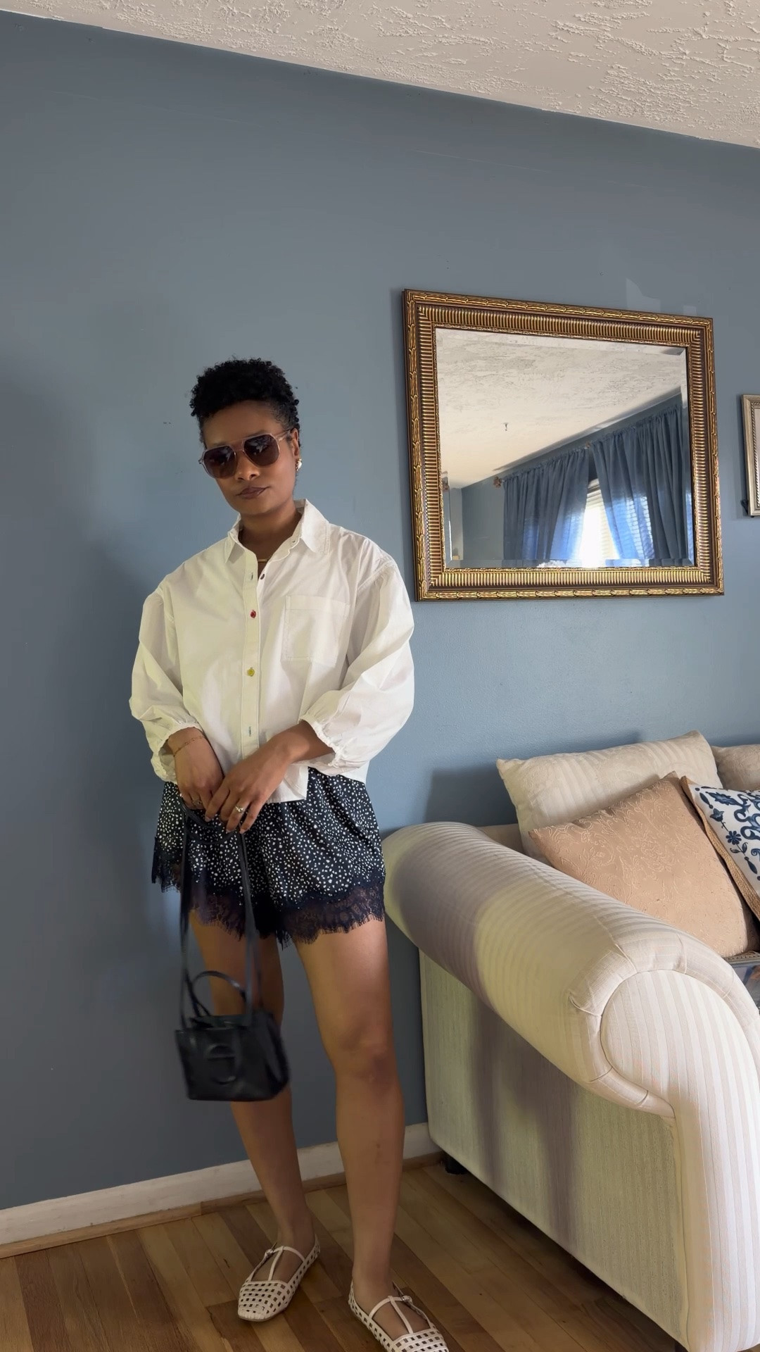 An easy spring/summer outfit: An oversized button up, lace shorts and caged flats!

#LTKootd #LTKgrwm #LTKSeasonal