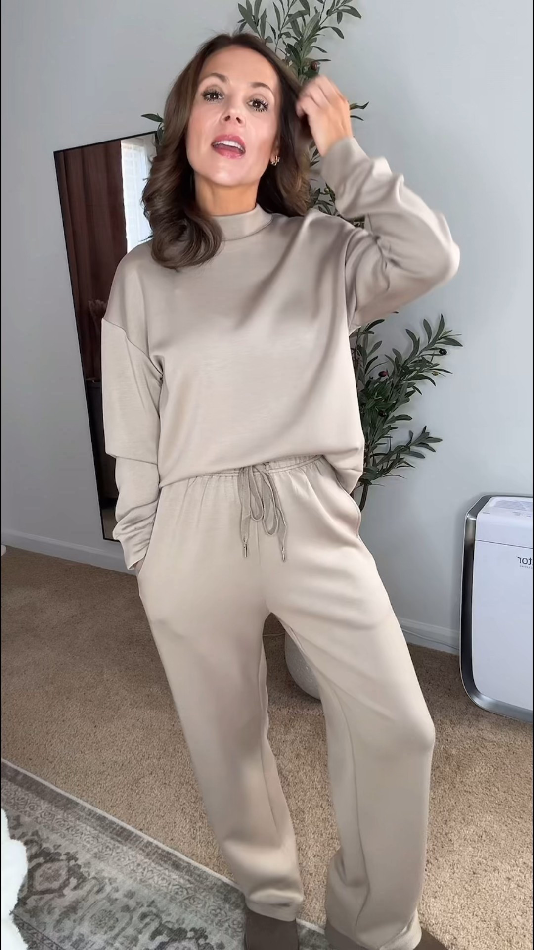 This is one of those outfits that quietly becomes your go-to. Same two piece lounge set, different day, same comfort.

The lightweight spacer knit fabric is soft and stretchy without being bulky, which makes it great for casual fall outfits, travel days, and everyday wear. The mock neck top adds structure, and the high-waisted wide leg pants are relaxed, flattering, and easy to move in. And yes — real pockets.

I’m 5’2”, 120 lbs wearing a size small, and the fit works for lounging, errands, and days when I just want to be comfortable without looking sloppy. This is one of those matching sets for women over 40 that you can wear together or mix and match with other wardrobe staples.

Simple, comfortable, and realistic — which is exactly what I want at this stage of life. #falloutfitswomen  
#loungewearset  
#womenover40style  
#matchingset  
#casualoutfits  
#airportoutfit  
#traveloutfit  
#comfyoutfits  
#momstyle  
#fallstyle  