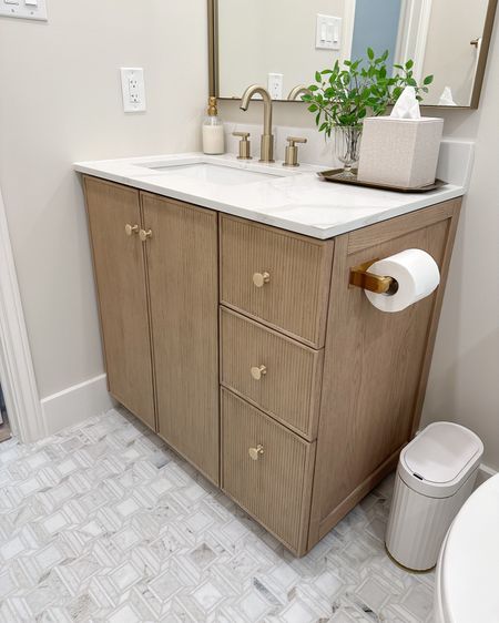 Fluted bathroom vanity! I was blown away by this piece! Built in charging, custom drawer features, and gorgeous marble top all for a reasonable price!

#LTKhome #LTKstyletip #LTKsalealert