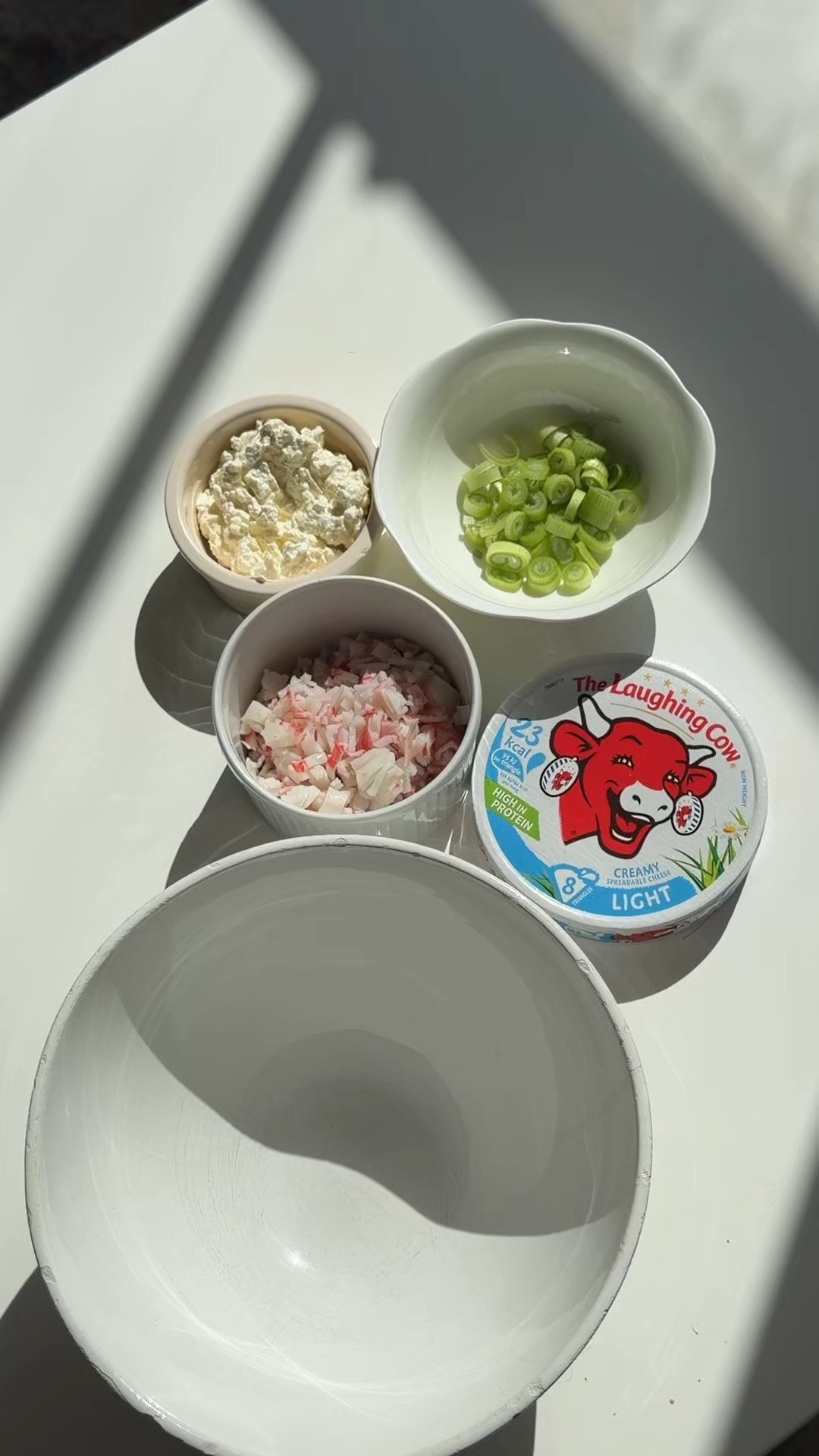 Health(ier) and more protein recipe for the viral crab rangoon burrito 
What you need:
-1 tortilla Protein Tortilla
-1/2 cup imitation crab meat
-1/4 cup Low Fat Cottage Cheese 
-2 Light Laughing Cow Cheese Wedges
-1 whole green onion
-1 tsp Maggi Seasoning Sauce 
-1 tsp sesame oil 
-spray oil for air fryer 

Mix everything together and spread flat onto protein tortilla. Fold long ways and spray before putting in air fryer. I left in air fryer until the tortillas was crispy and brown. Enjoy with a sweet chili sauce xx 

#LTKfitnessgoals #LTKActive #LTKHome