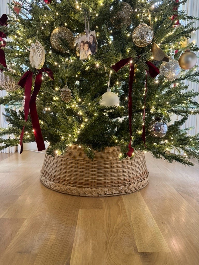 Creating a timeless holiday look with pieces I reach for year after year — the McGee & Co. woven tree collar, classic silver and gold ornaments, and deep wine-red ribbons for that subtle, old-world warmth. Layered, elevated, and easy to mix with any neutral holiday palette.

Shop everything I used to style this look below. 

#LTKHoliday #LTKHome #LTKSeasonal