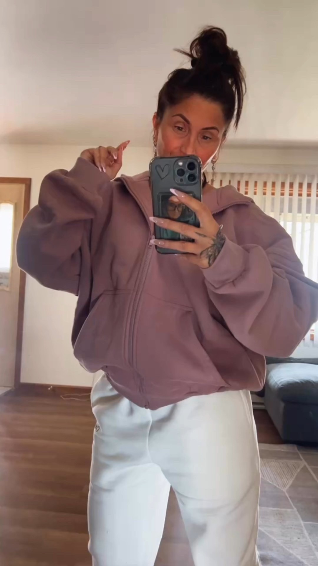 This is the orchid cloud zip. Super roomy super cozy slightly waited. It is oversized so size down one for a true fit if you want to be more oversized stay true to size.  
5.4” 133lbs Wearing a size small on both top and bottom

#LTKActive #LTKGiftGuide #LTKSeasonal