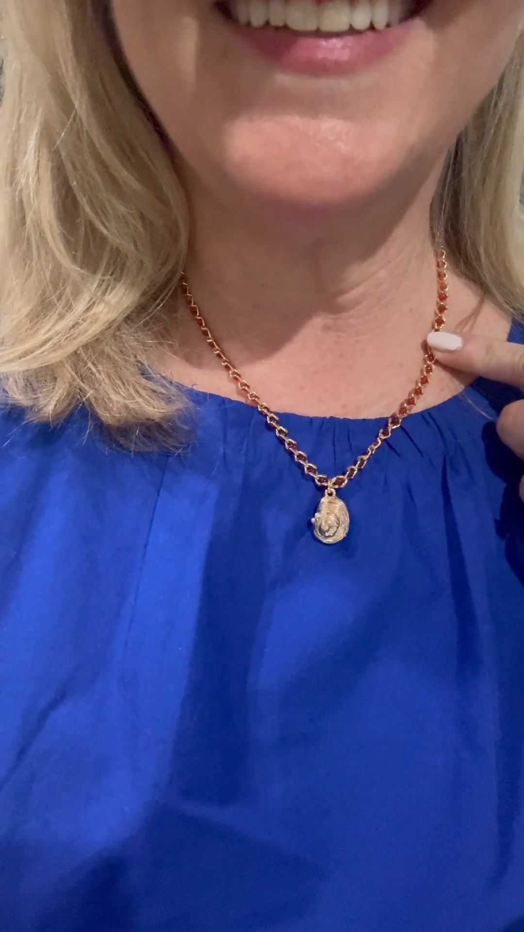 Cute shell necklace on major sale.  I love it with the cobalt blue top

#LTKootd #LTKOver40 #LTKMidsize