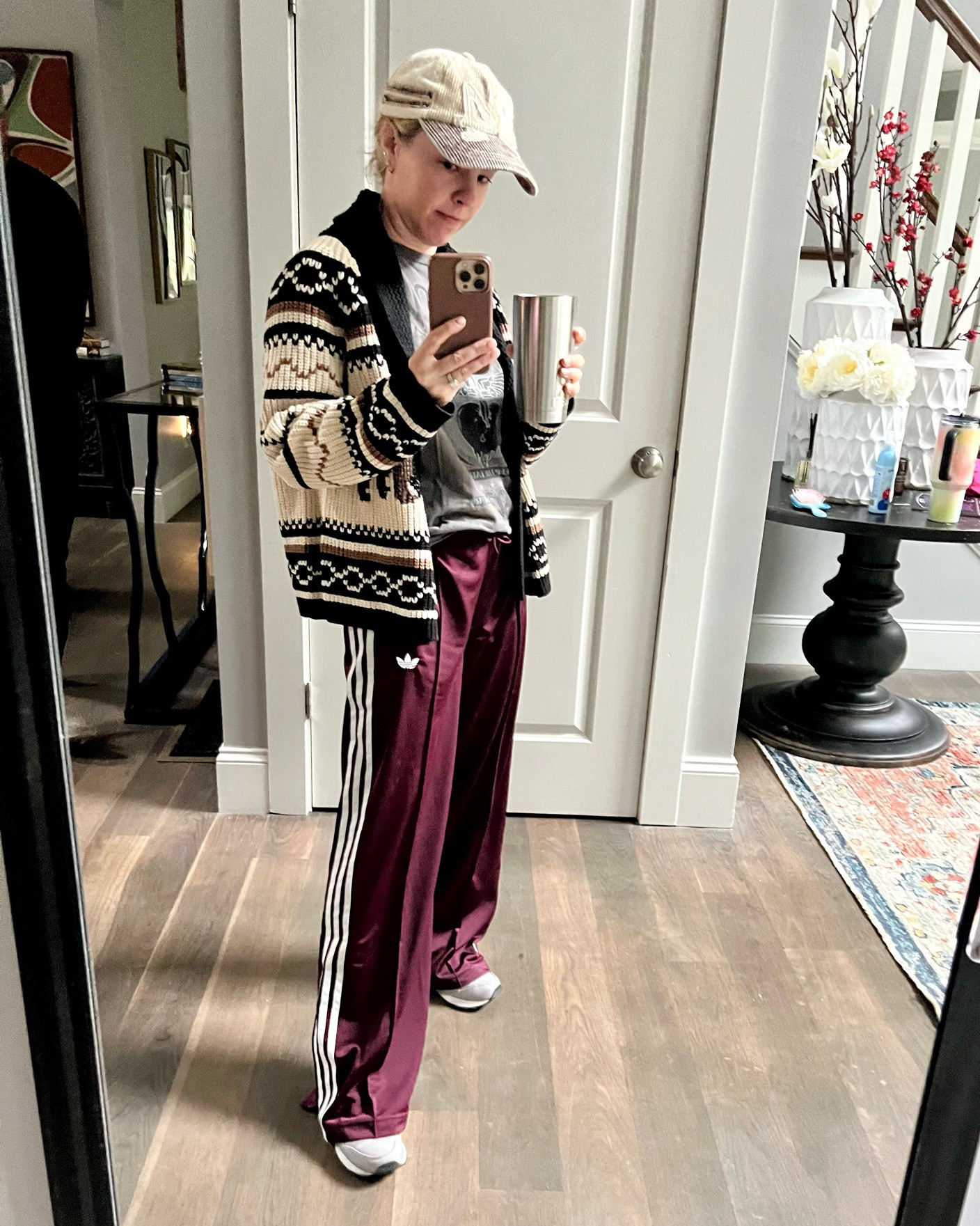 Bus stop chic? I’ve always had respect for a look that is thrown together, doesn’t really go, but somehow works. Like the girl in college who could roll into breakfast in her PJs and somehow still look cool. This is my spin on that thrown together vibe. Topped with a new sweater I grabbed on my trip in Cali.

#LTKOver40