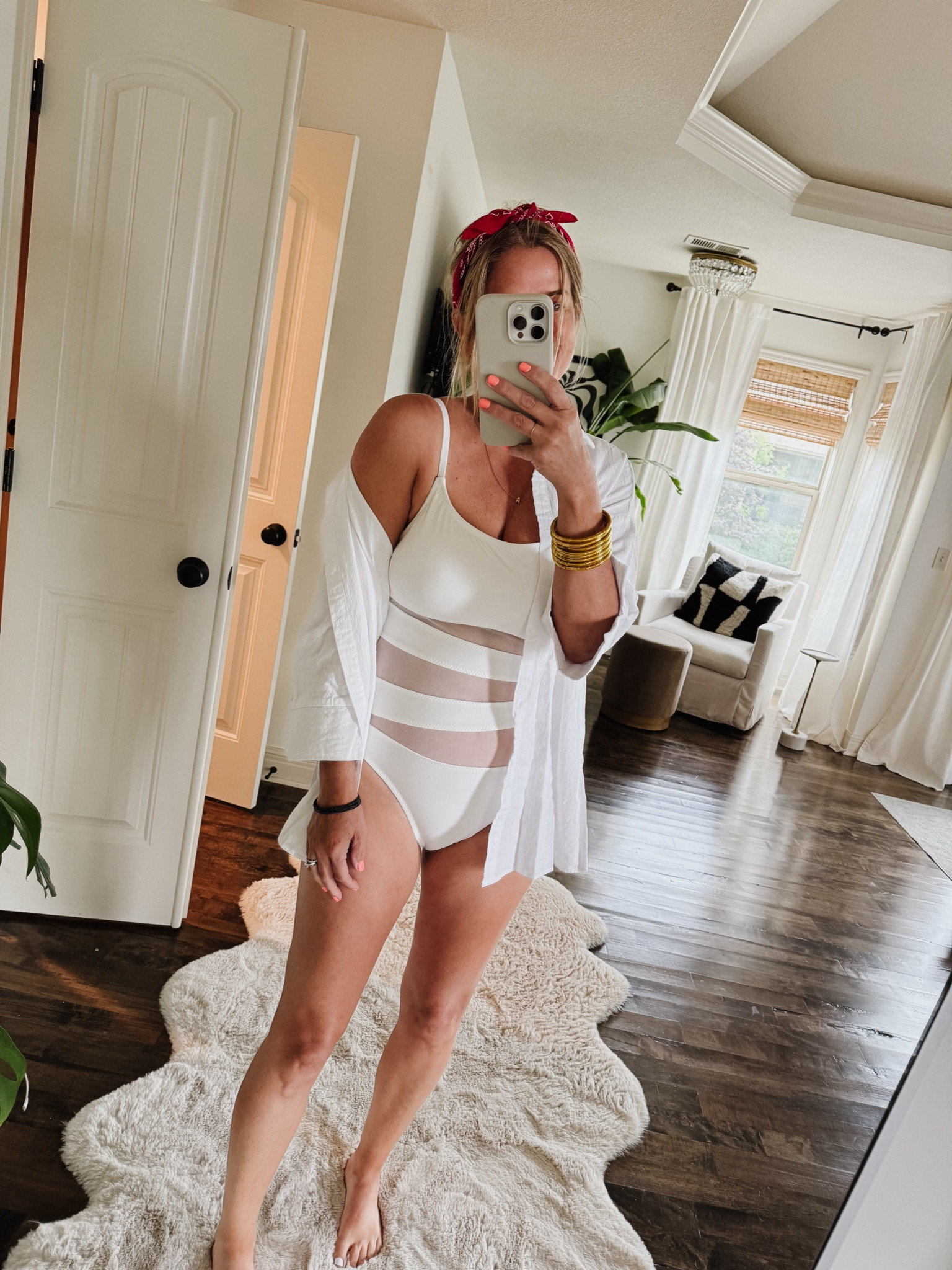 White swimsuit (in a medium), white cover up, red bandana, gold bracelets 

#LTKSaleAlert #LTKOver40 #LTKSwim