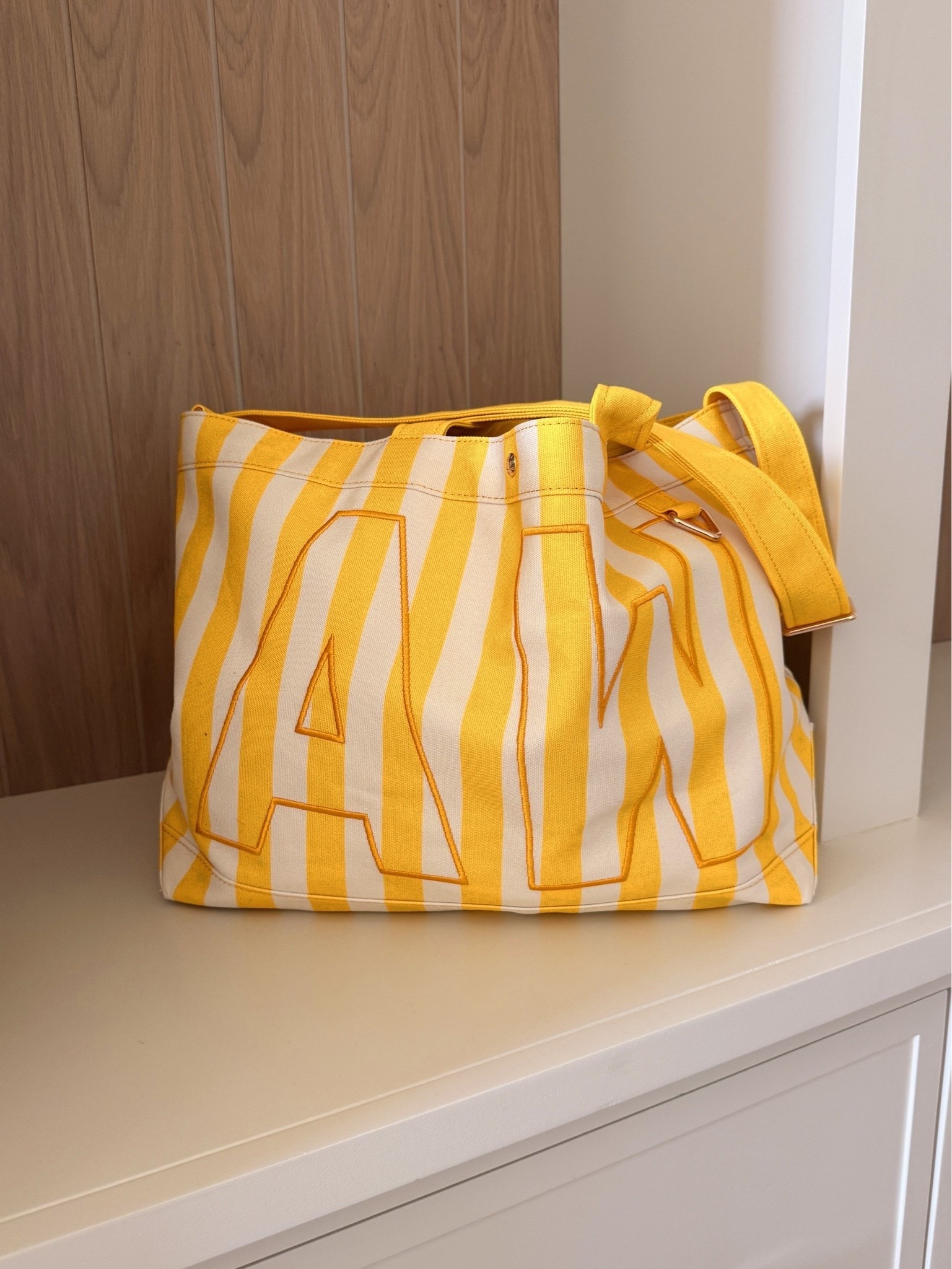 Absolutely love this striped canvas tote! This is the large.

#LTKmomlife #LTKSwim #LTKTravel
