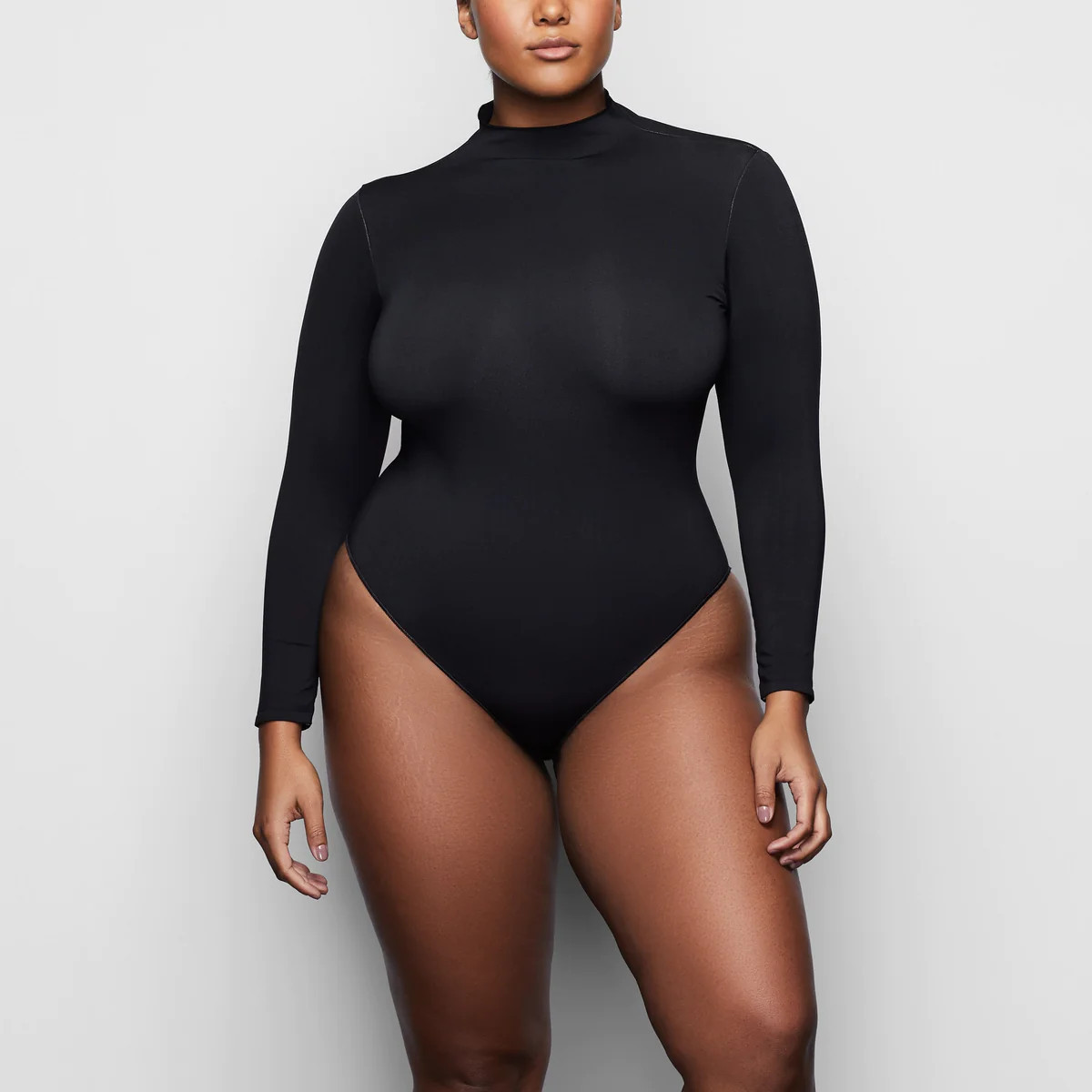 ESSENTIAL MOCK NECK LONG SLEEVE BODYSUIT | SKIMS (US)