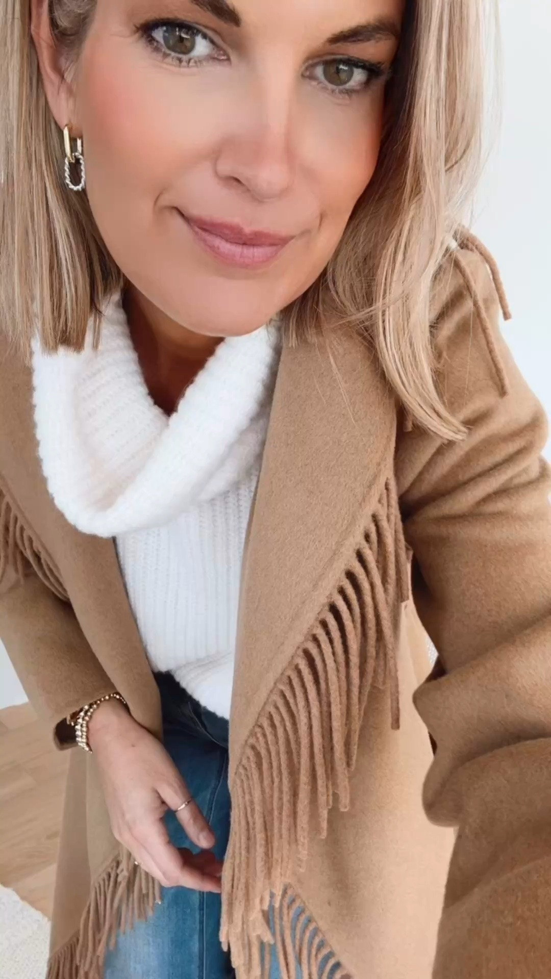 Small fringe jacket. Small top. 27x34 jeans. I am 5’11”.  Mules true to size.