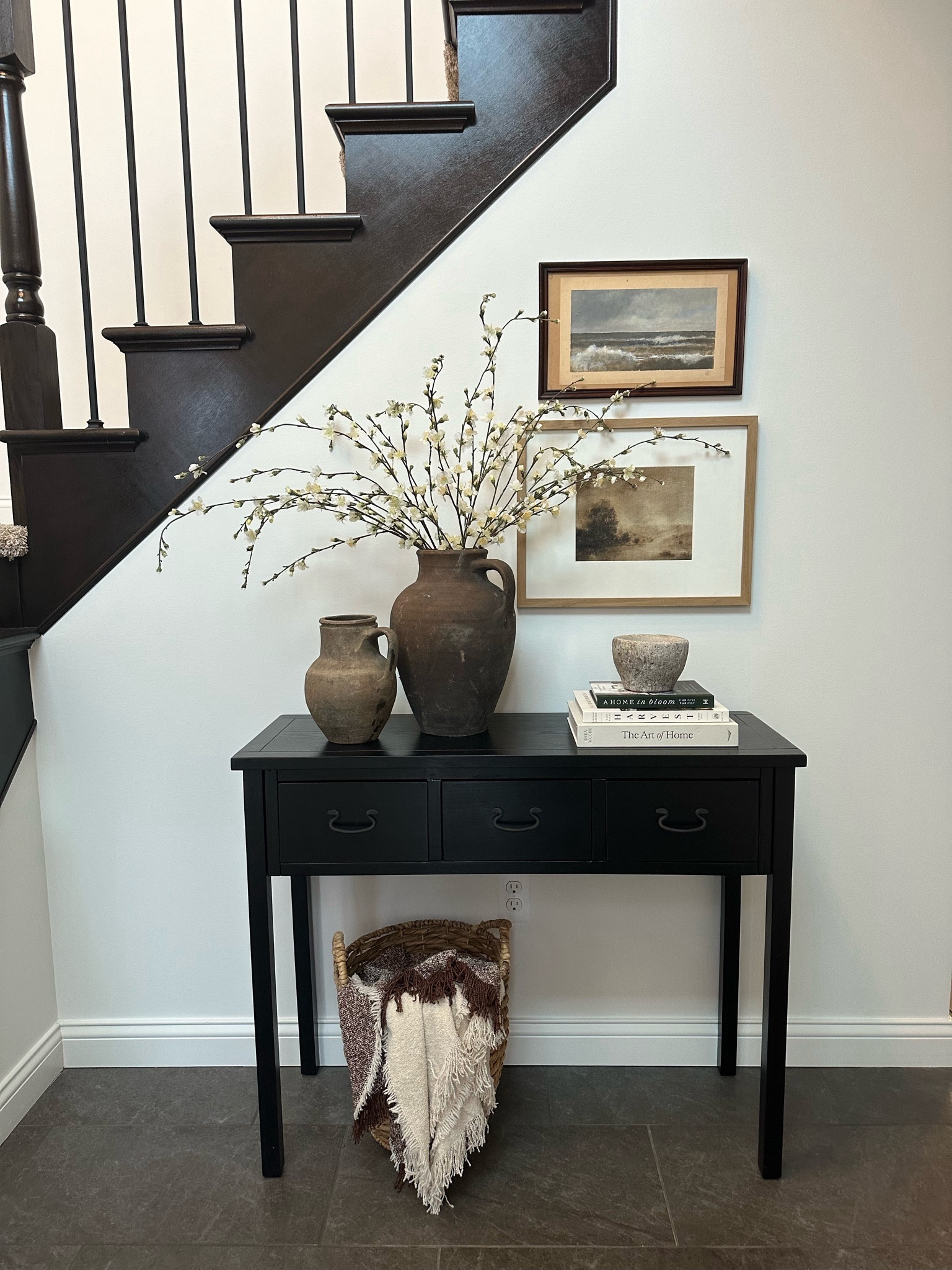 Small entry way along staircase. The art prints are from Aileen Fitzgerald  

#LTKhome #LTKfindsunder50 #LTKfindsunder100