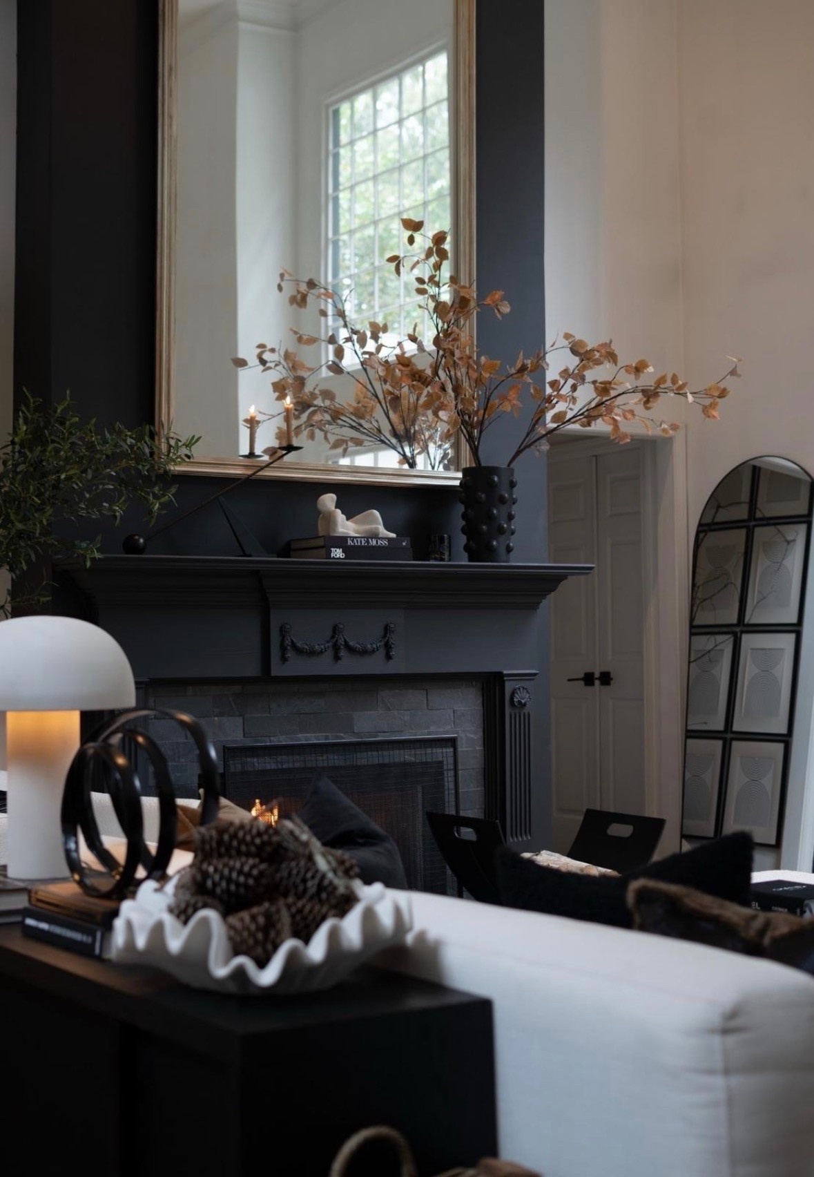 OMG. This view when you walk through the front door seriously takes my breath away every single time!. The faux golden stems  bring in so much warmth and contrast beautifully against the black fireplace. They’re so realistic, full, and effortless, and I love how they make the entire space feel cozy yet elevated to complete the space! Obsessed is an understatement!!!#LTKStyleTip

#LTKSeasonal #LTKHome #LTKSaleAlert
