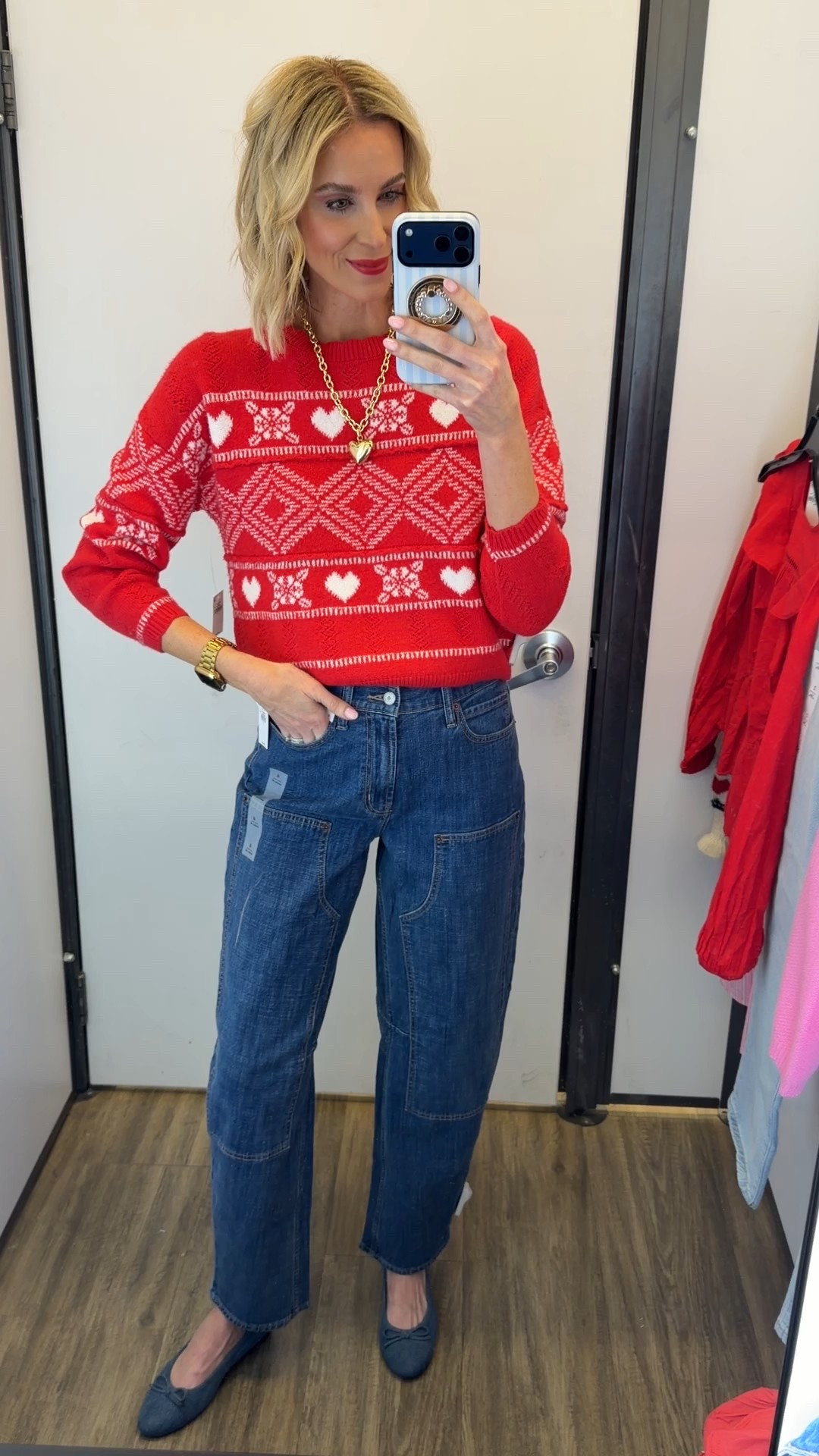 Old Navy red Valentine’s Day heart sweater with utility barrel leg jeans 