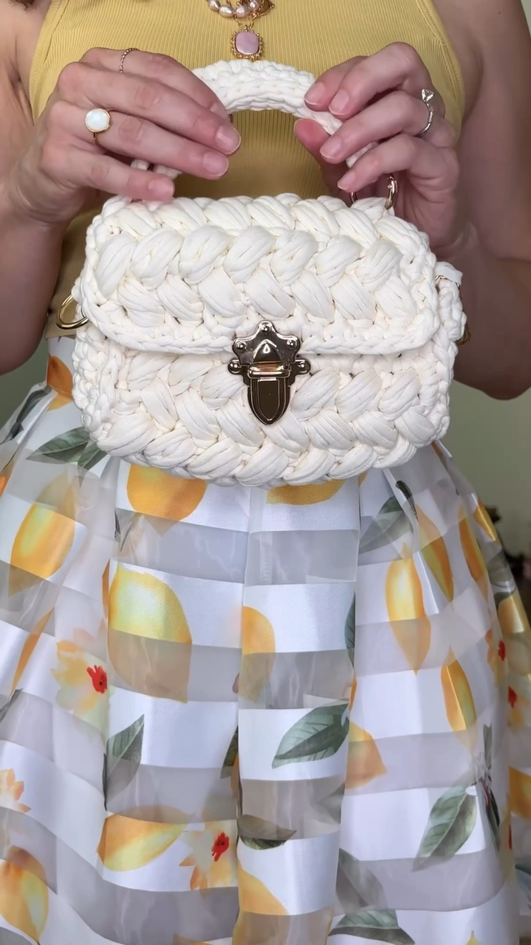 Extreme heat advisory over here in Florida! Stay safe, drink water or lemonade 🍋 petite friendly lemon print midi skirt, bra free tank top, mini rope purse 💛😍

#LTKItBag #LTKStyleTip #LTKPetite