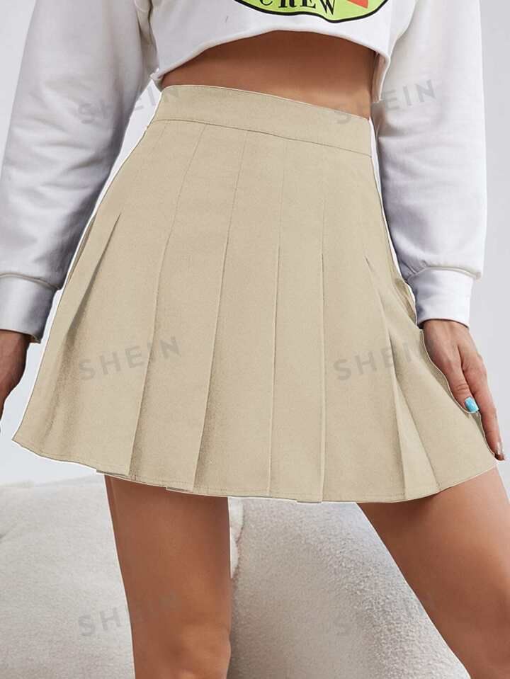 SHEIN Qutie Abrikooskleurige plooirok in collegestijl, perfect voor terug naar school | SHEIN