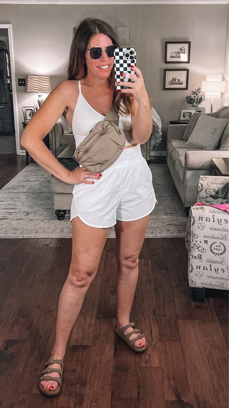Summer athleisure style: perfect for the hot humid weather we are having!

The shorts are 30% off right now/under $18. They come in a few colors they are true to size. They have one slip pocket and one zip pocket and they are fully lined. 

This look for last belt bag is under $23 and it comes in several colors sunglasses are on sale under $13 and you can get these Birkenstock sandals for less on Amazon for $30 

This bra tank is one of my favorite it’s ribbed. It has a really cute strappy detail on the back and it’s long enough to wear with high rise shorts. 


#LTKstyletip #LTKunder50 #LTKFind
