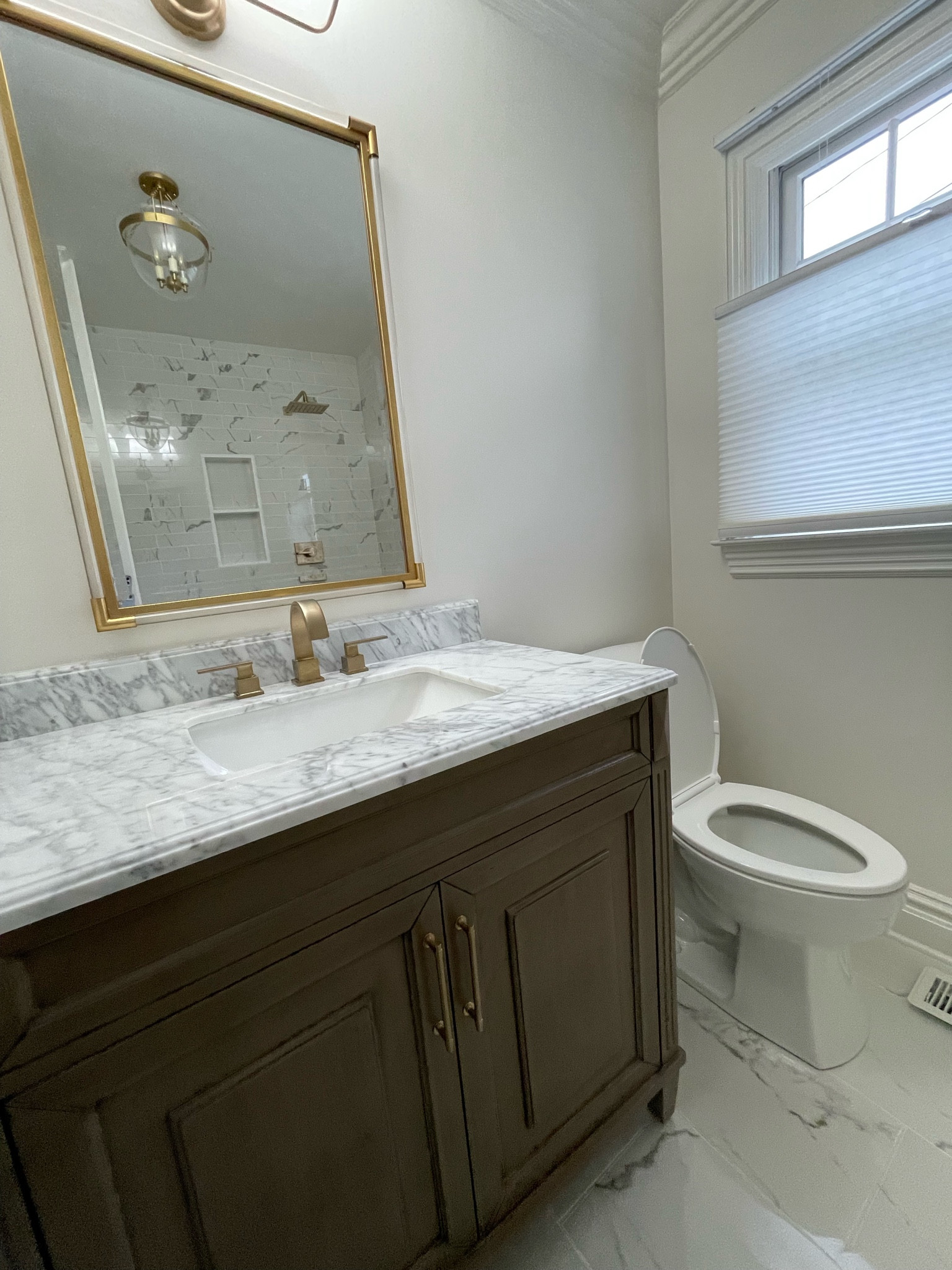 Our bathroom renovation! linking what I can below! 

Vanity from Floor & decor 
Hardware: Koehler 

#LTKFind #LTKhome #LTKfamily