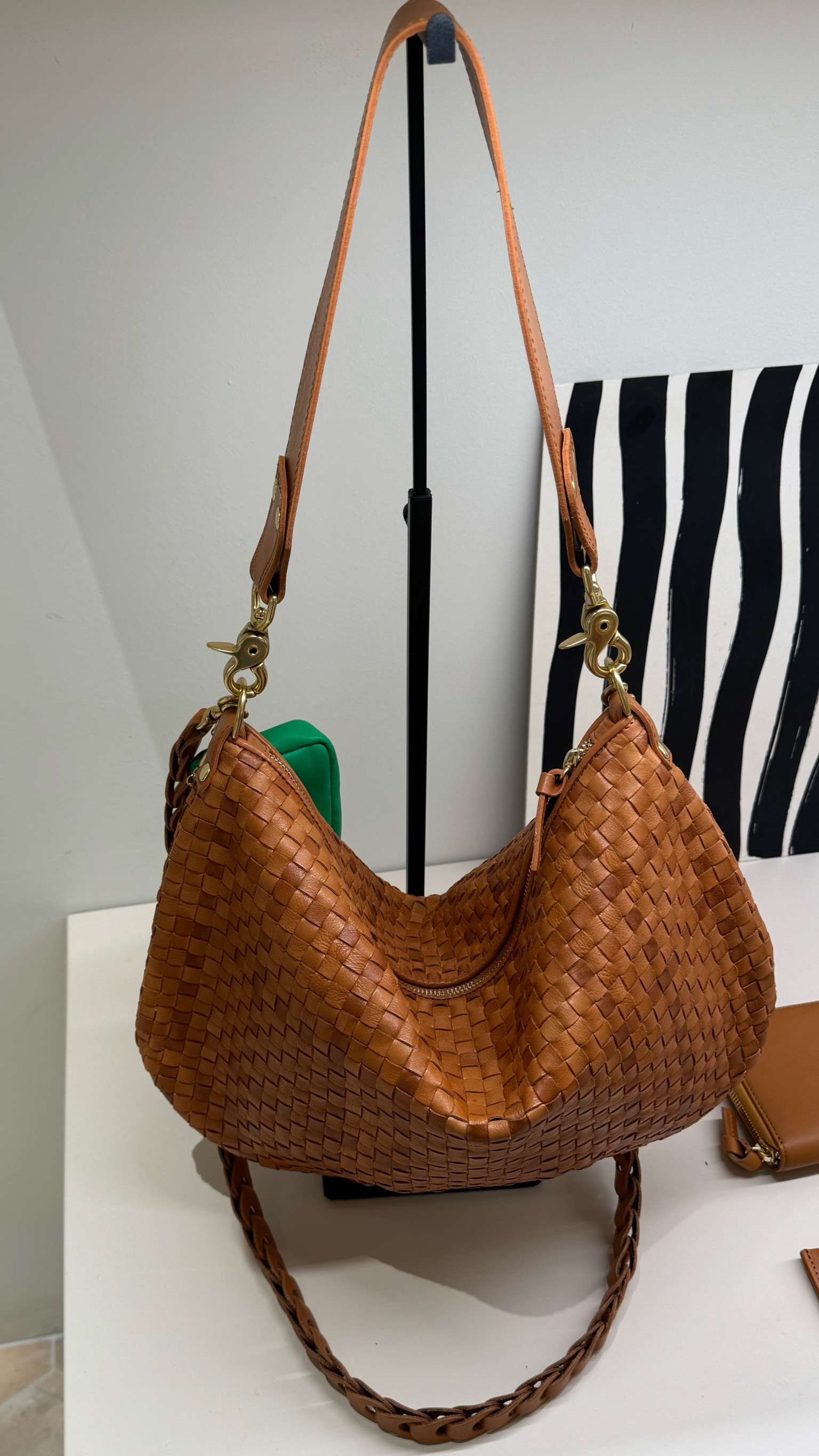 This messenger bag is absolutely stunning in person and I wish I had a reason for it! It’s big enough to be a work bag but also perfect for travel or casual use. It comes in tons of color options and smooth or braided leather too. 

#LTKStyleTip #LTKItBag