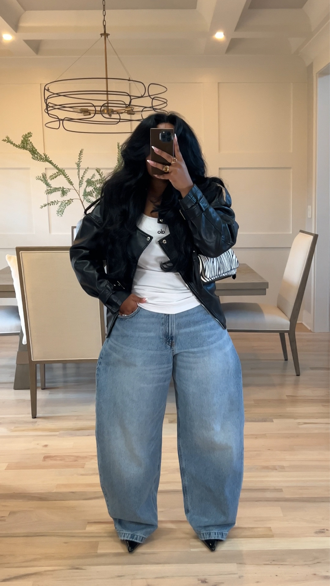 The most perfect casual barrel jean by KBB!! Styled them with a white ribbed tank, leather moto jacket, and the printed handbag adds a great elevated touch! 