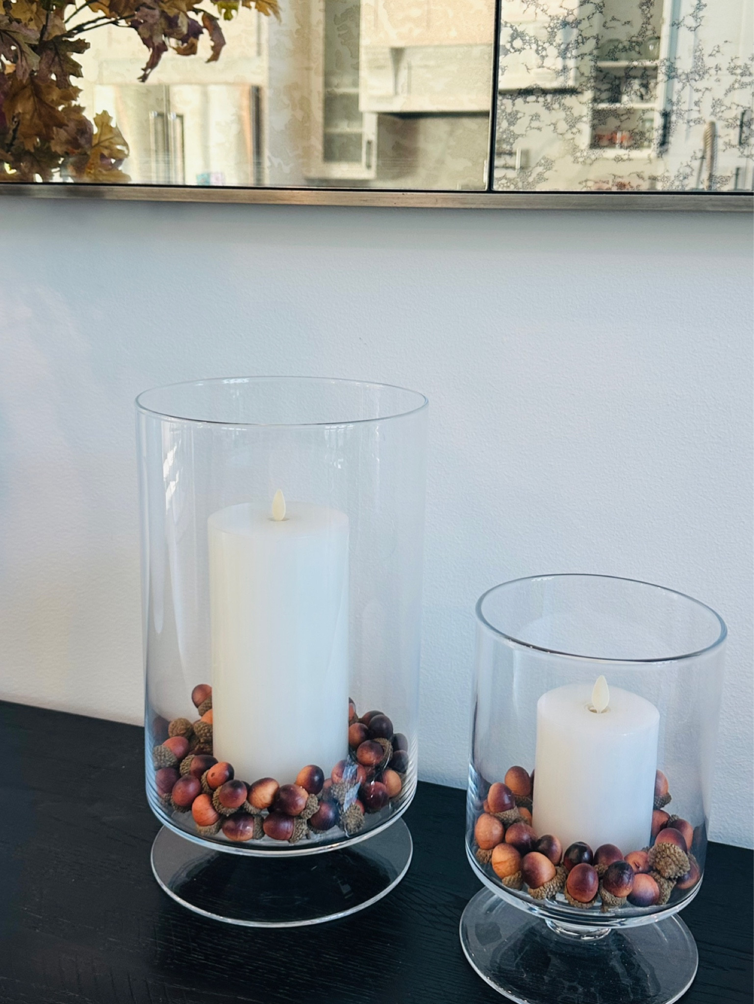 New hurricanes and filler! These can be styled so many different ways! I paired them with an acorn filler for fall. Easily transition to the holidays with cranberry filler! 

Hurricane | Glass Hurricane | Crate & Barrel | Acorn Filler | Fall Decor 

#LTKhome #LTKSeasonal #LTKunder100